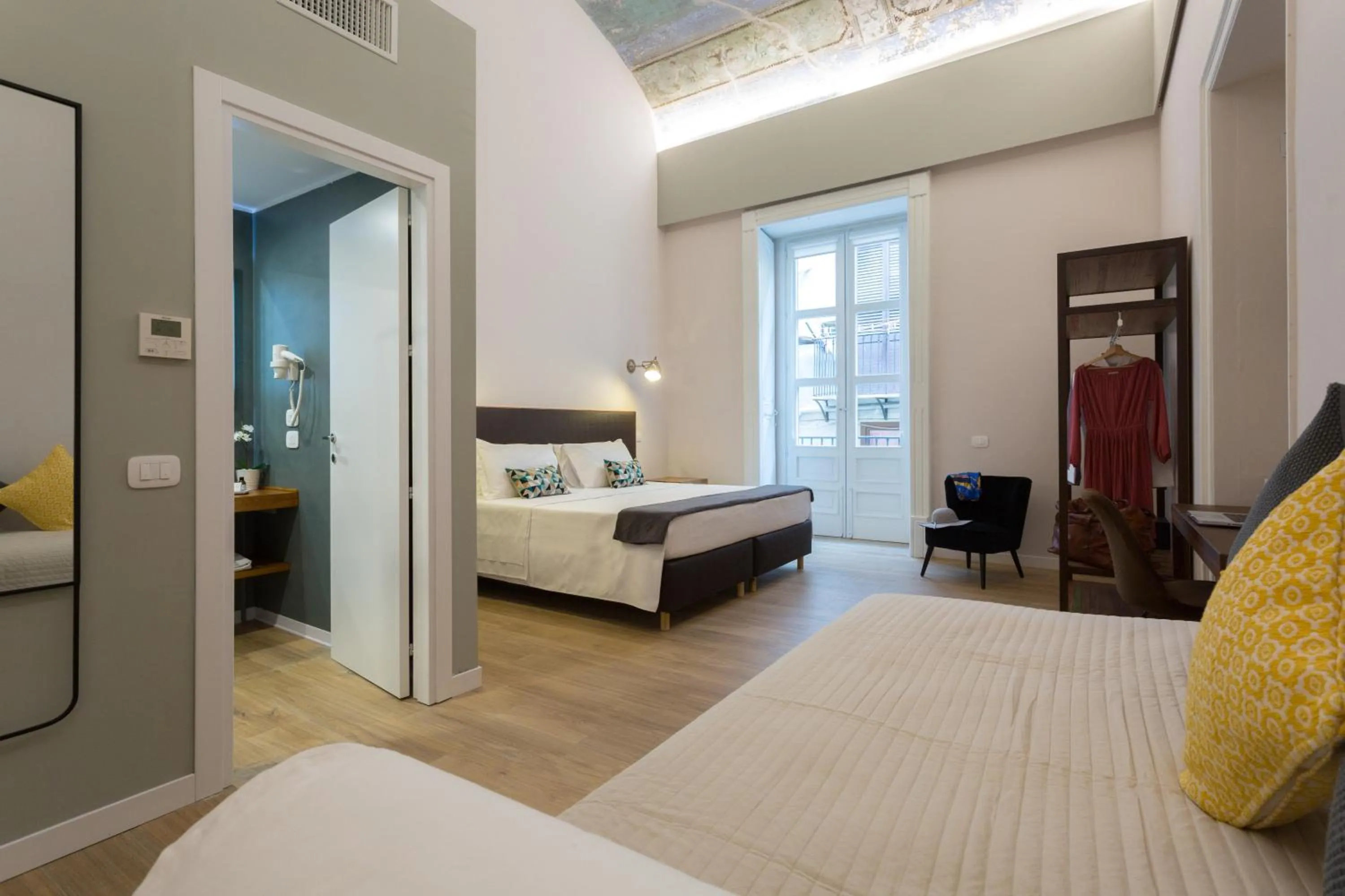 Bed in Bellaroto Suite & SPA