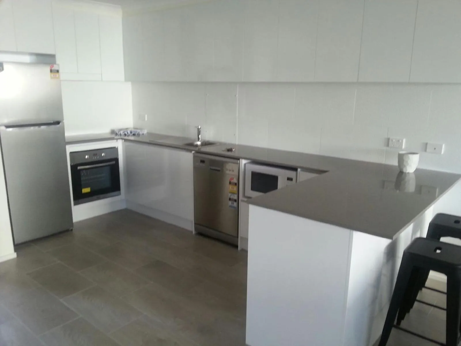 Kitchen or kitchenette in Broadbeach Travel Inn Apartments
