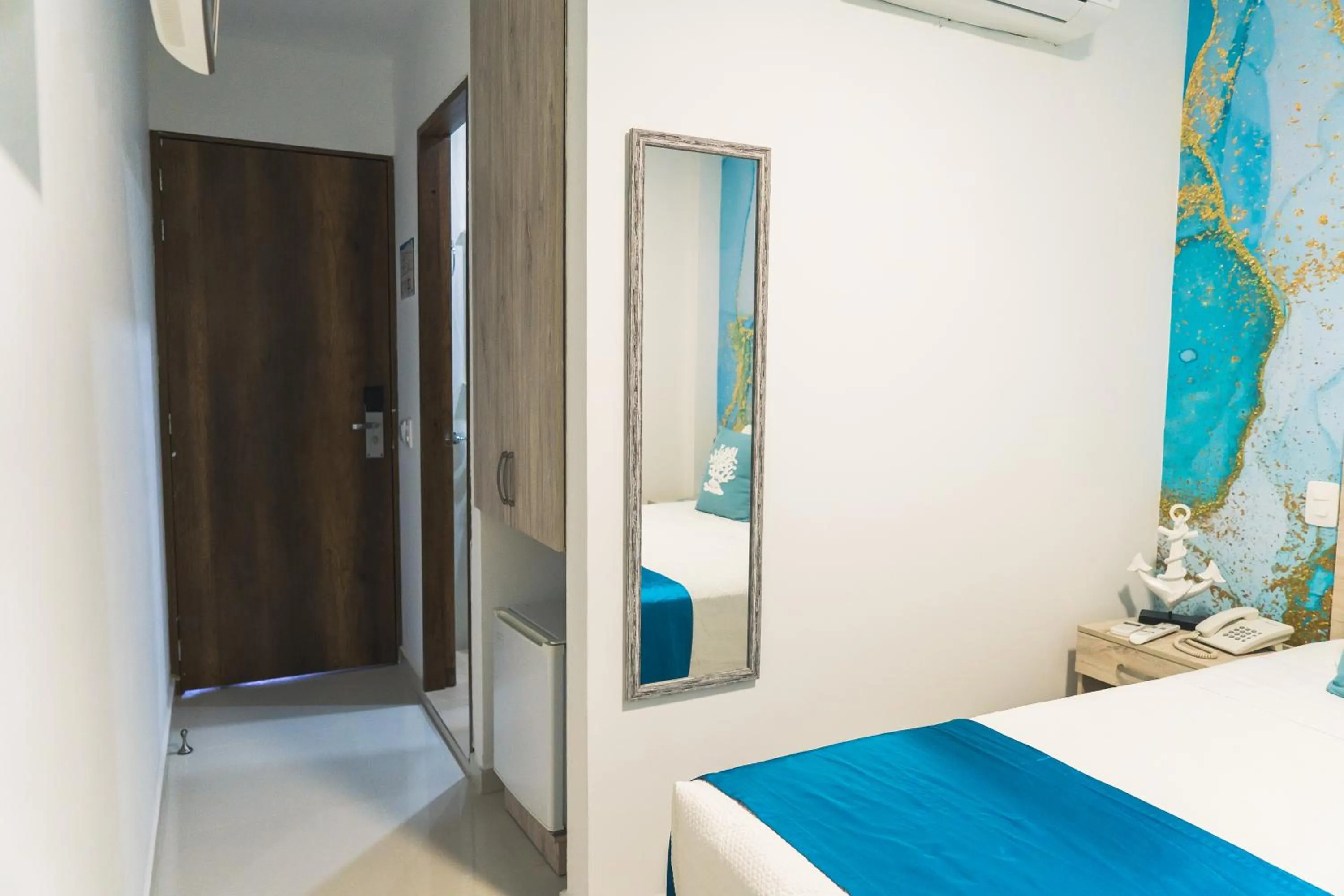 Photo of the whole room, Bed in Sea Colors Hotel