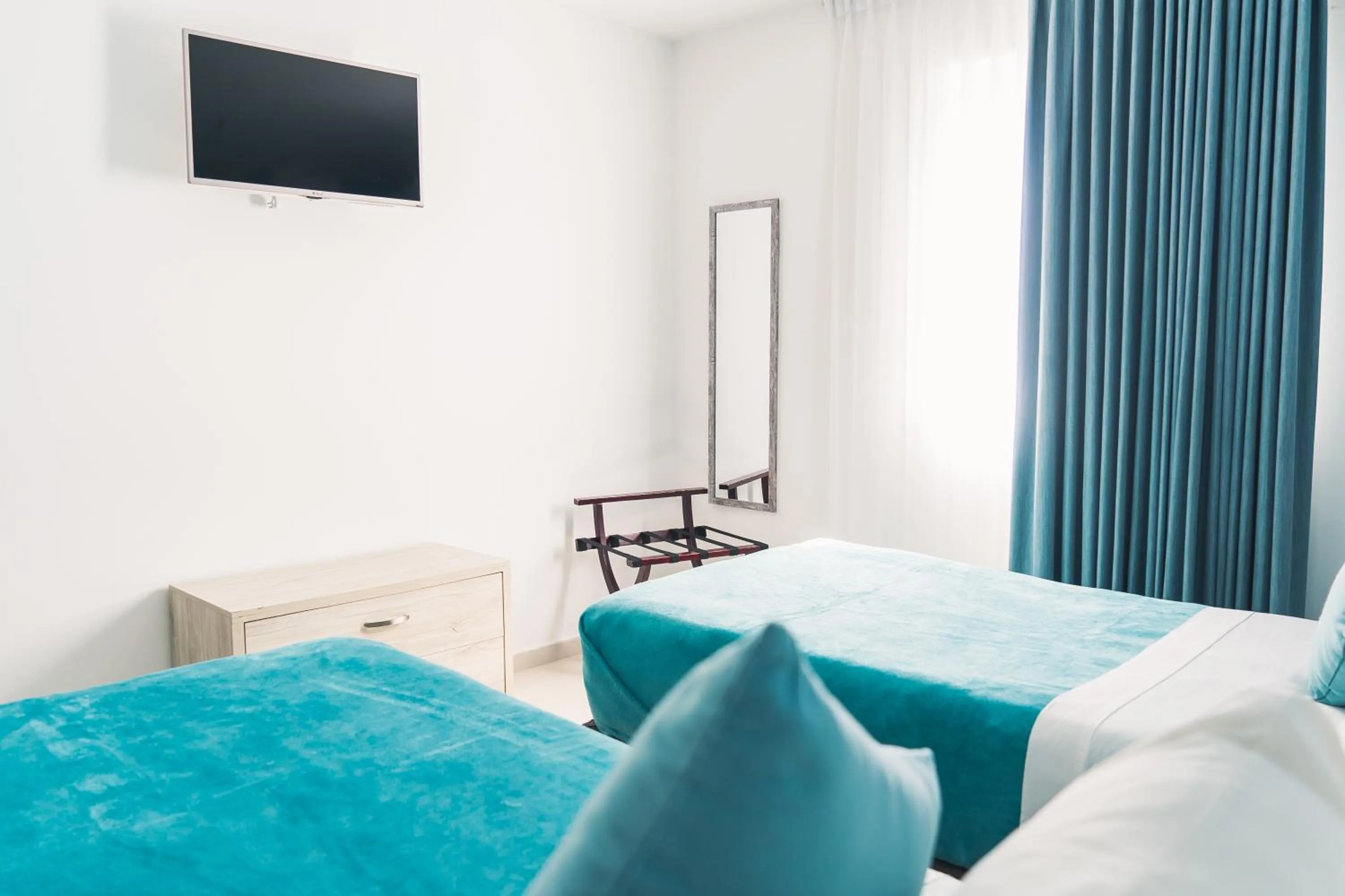 Photo of the whole room, Bed in Sea Colors Hotel