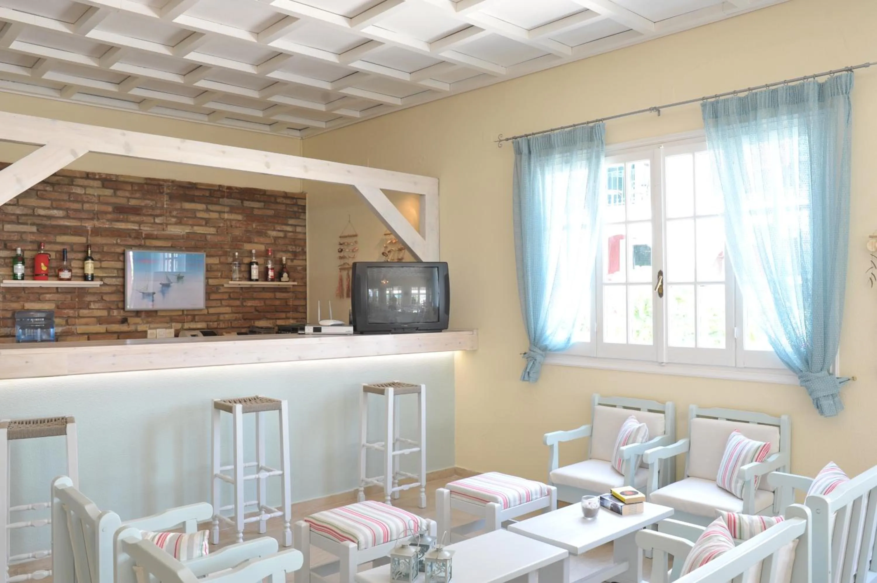 Lounge or bar in Iliada Beach Hotel