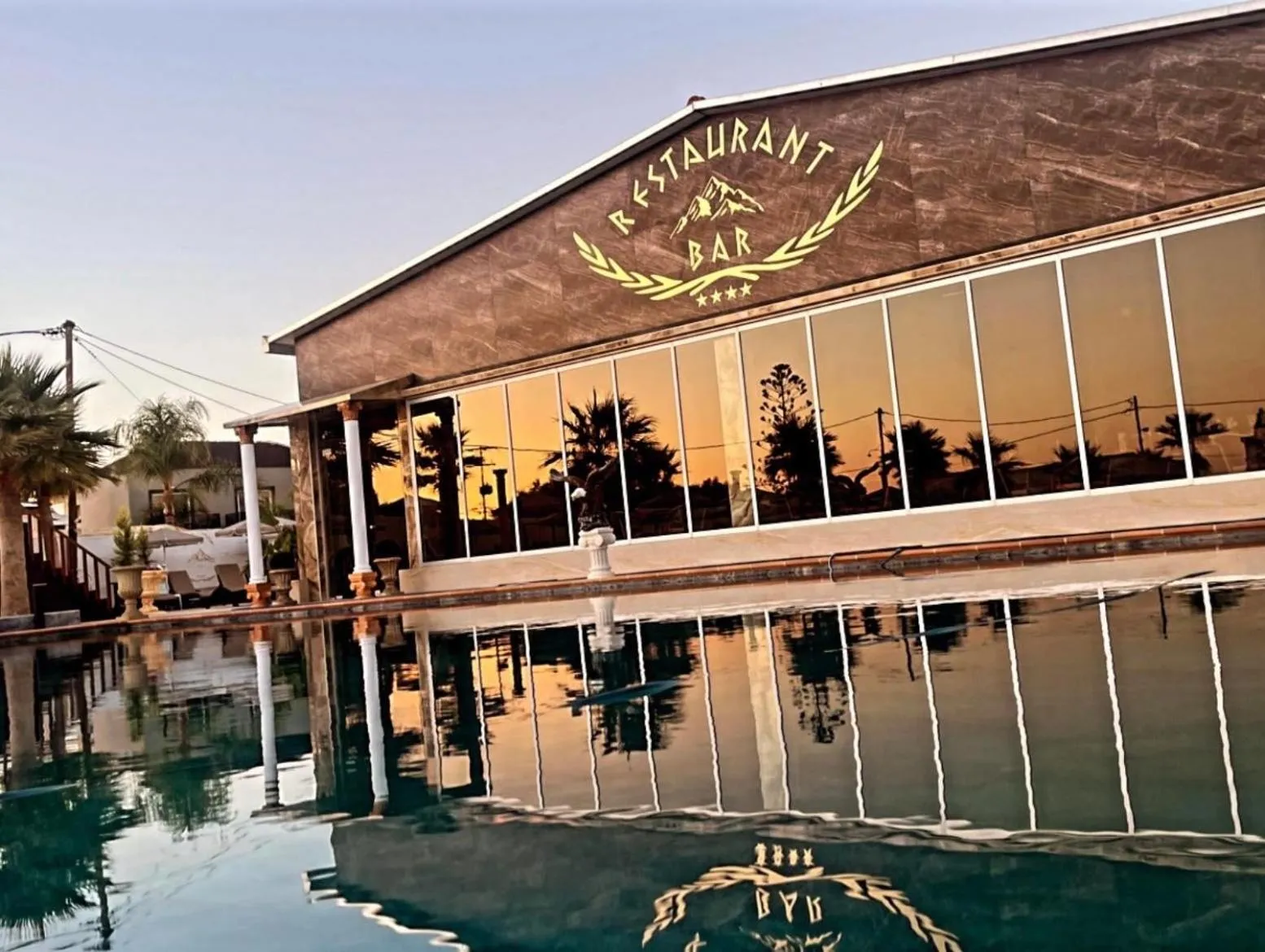 Swimming pool in Paradice Hotel Luxury Suites-Near zorbas Beach-FREE Breakfast