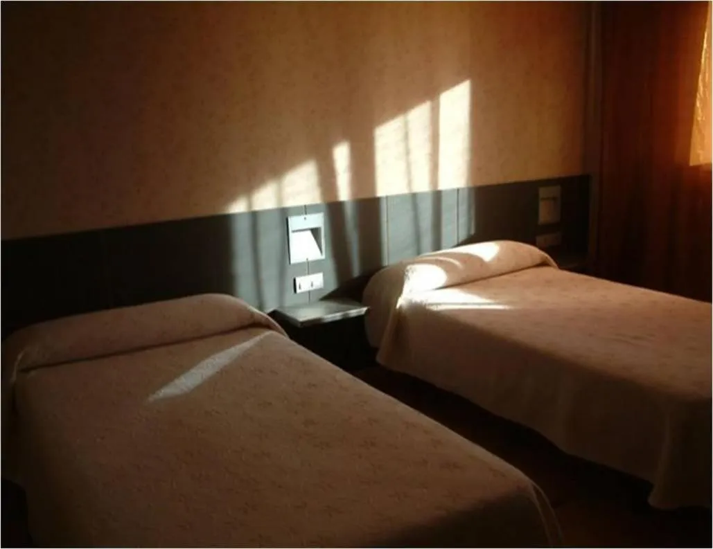 Photo of the whole room, Bed in Hotel Area Serrano