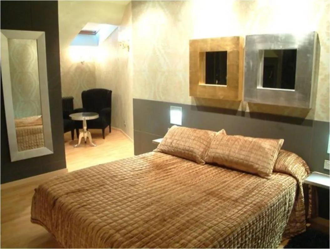 Photo of the whole room, Bed in Hotel Area Serrano