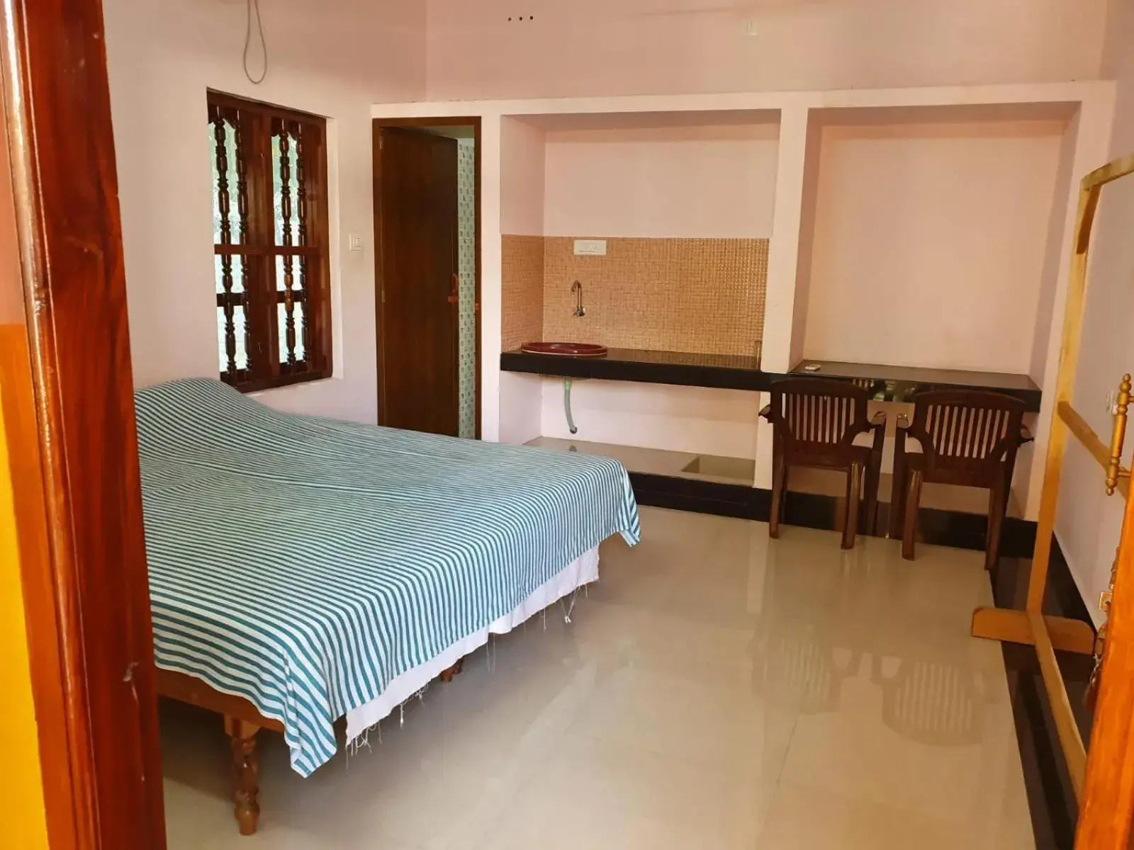 Budget Double Room - single occupancy in Thriphala Ayurveda Yogashram Budget Double Room - single occupancy in Thriphala Ayurveda Yogashram