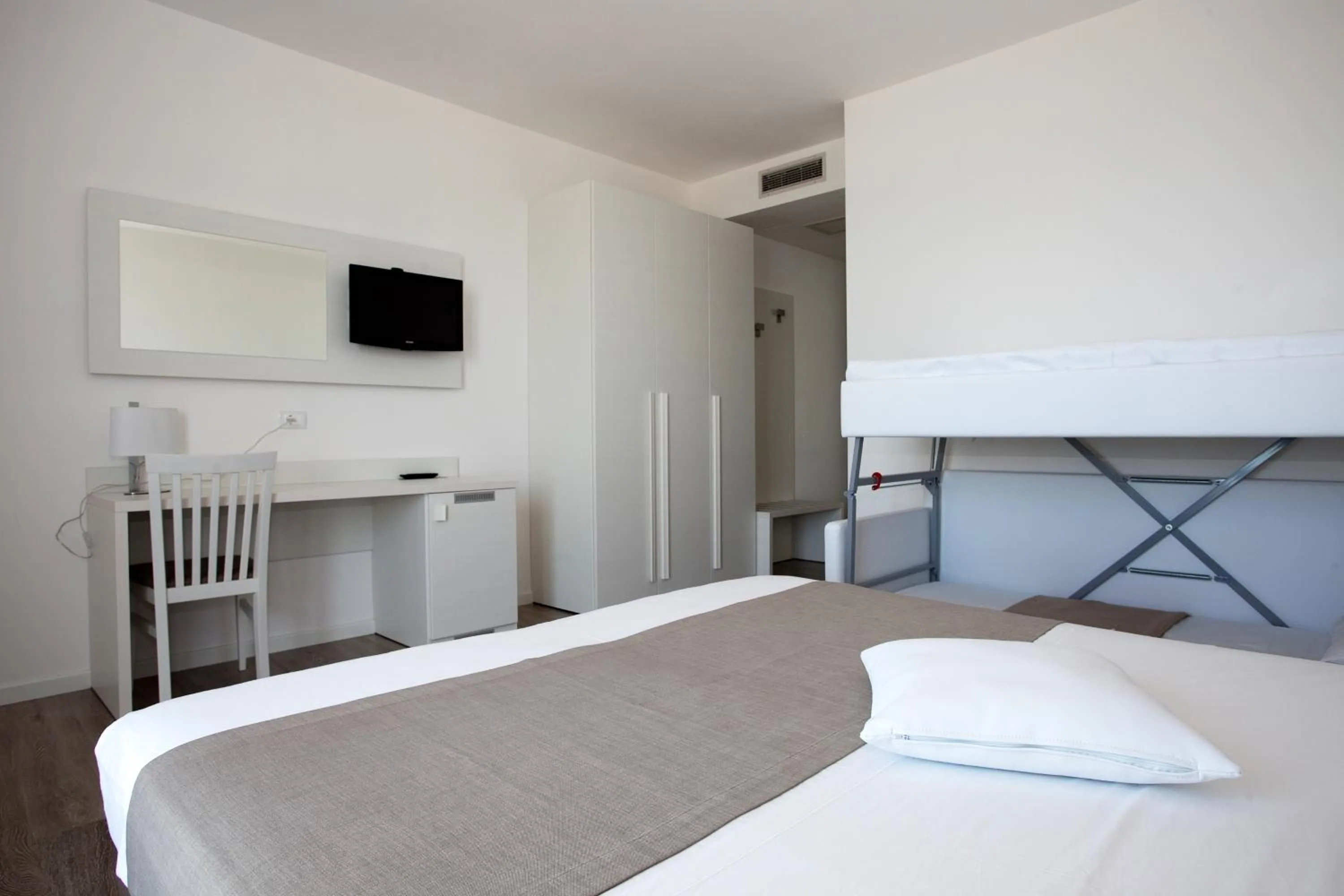 Bed in Hotel Columbia & Ninfea