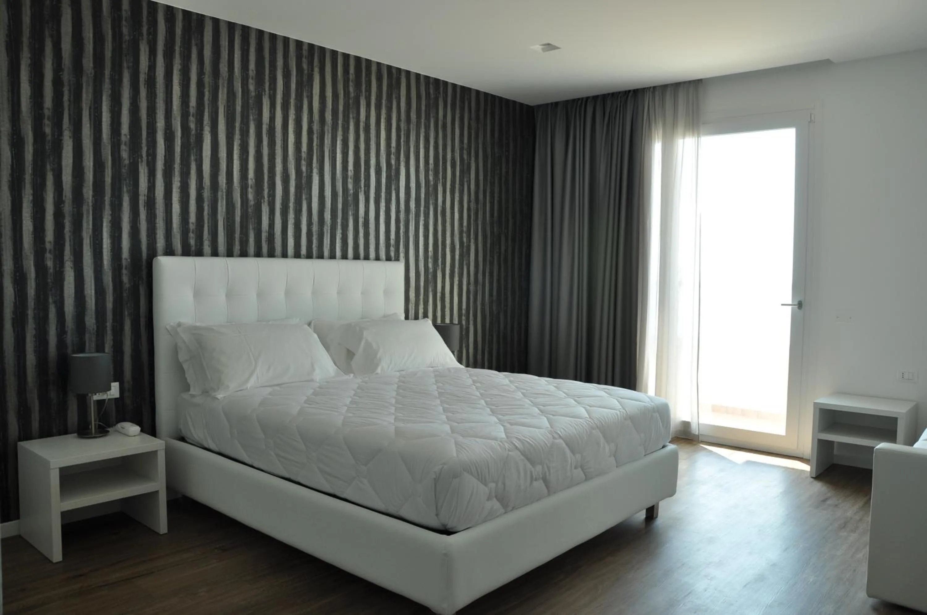 Bed in Hotel Columbia & Ninfea