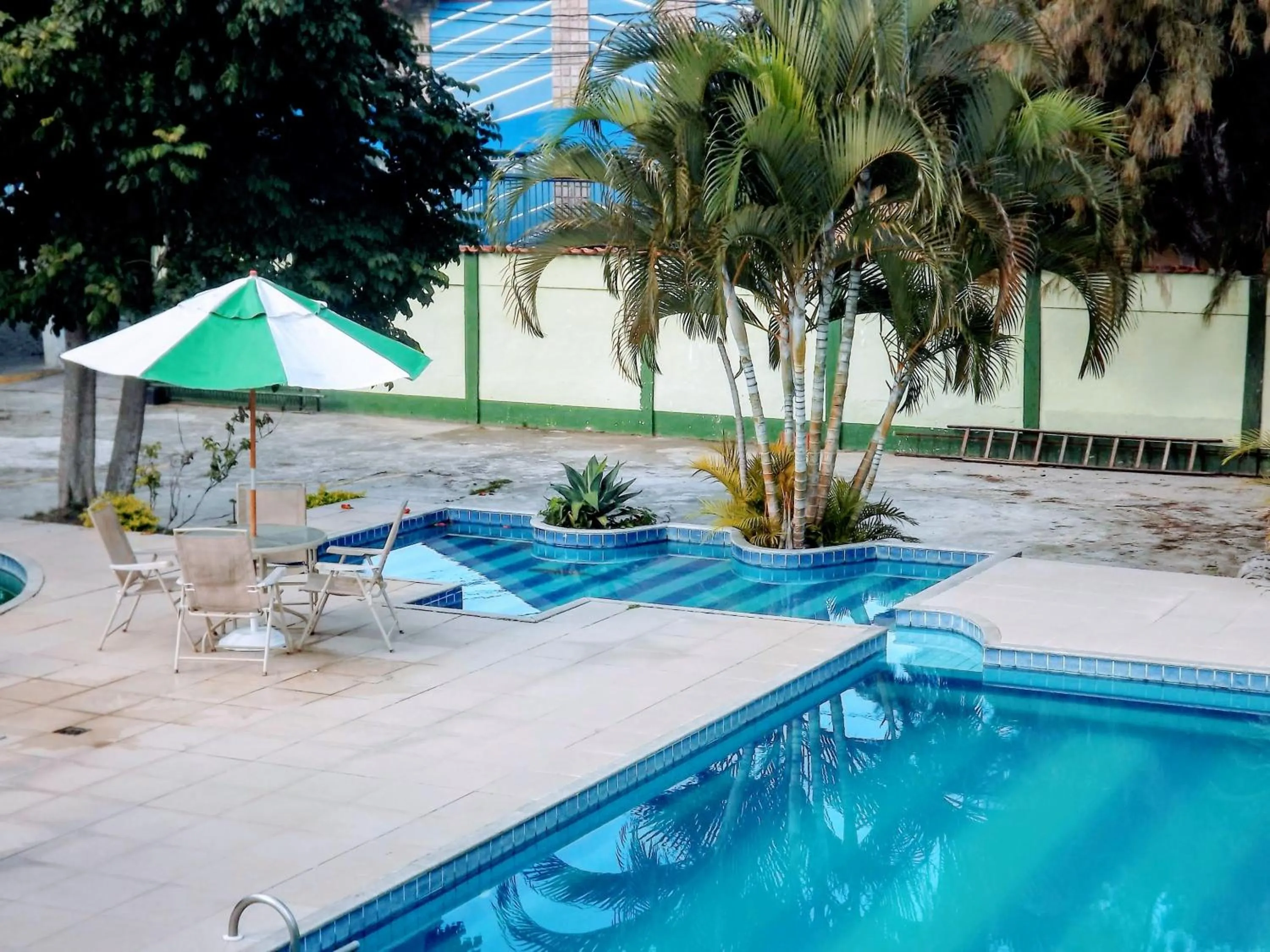 Swimming pool in OYO Pousada Recanto Shangrilá, Cabo Frio