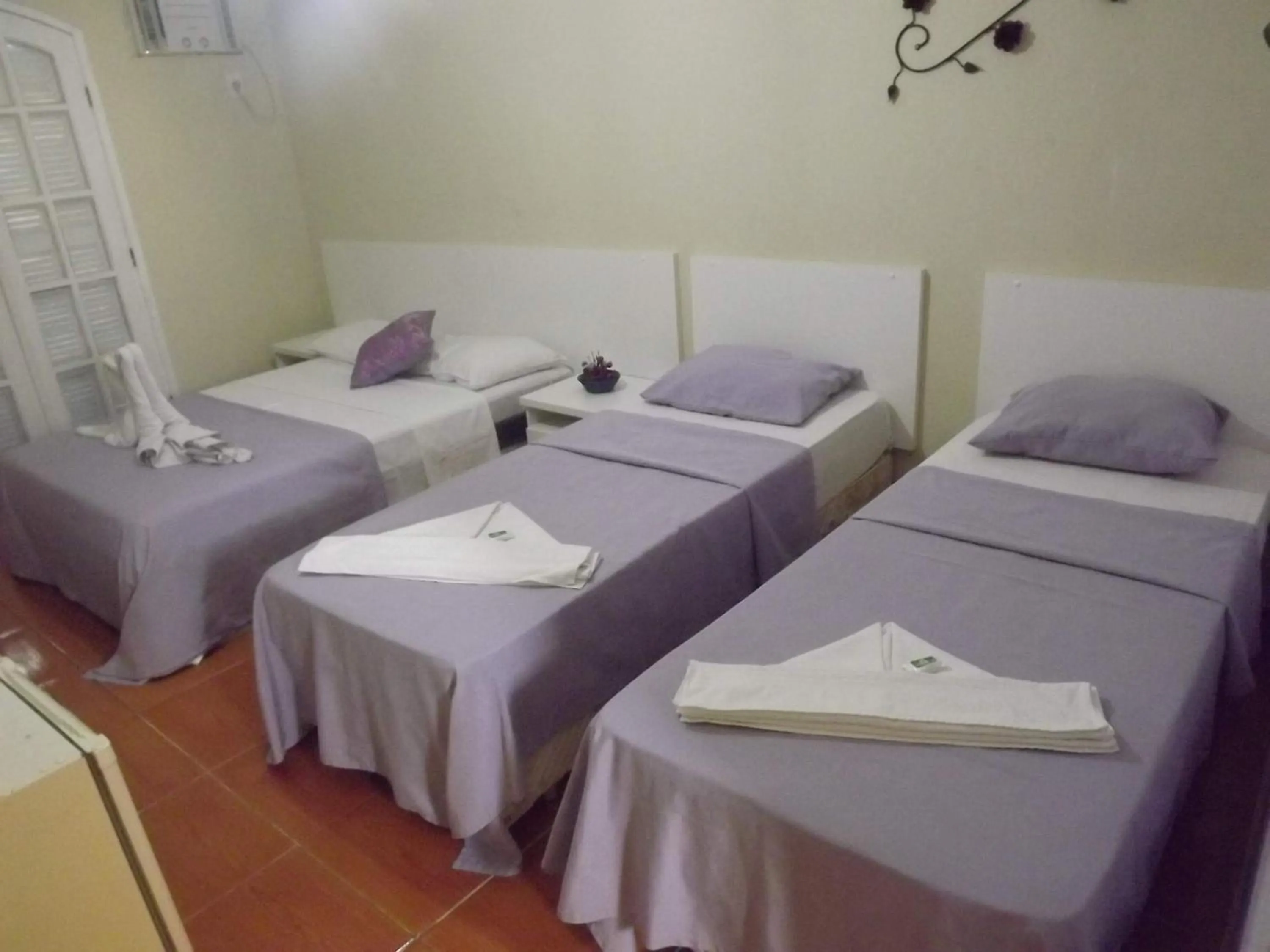 Bedroom in OYO Pousada Recanto Shangrilá, Cabo Frio