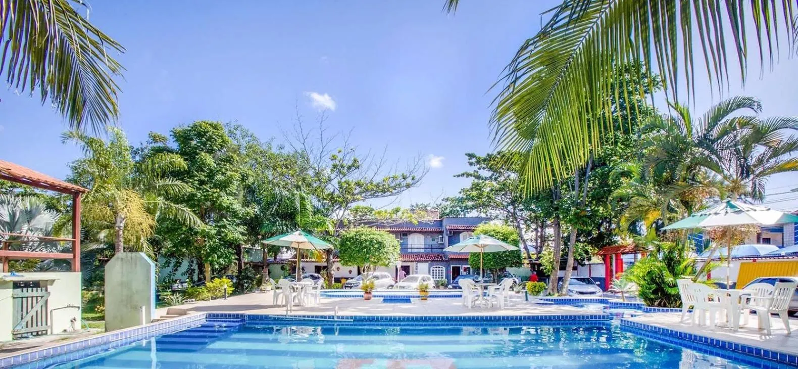 Swimming pool in OYO Pousada Recanto Shangrilá, Cabo Frio