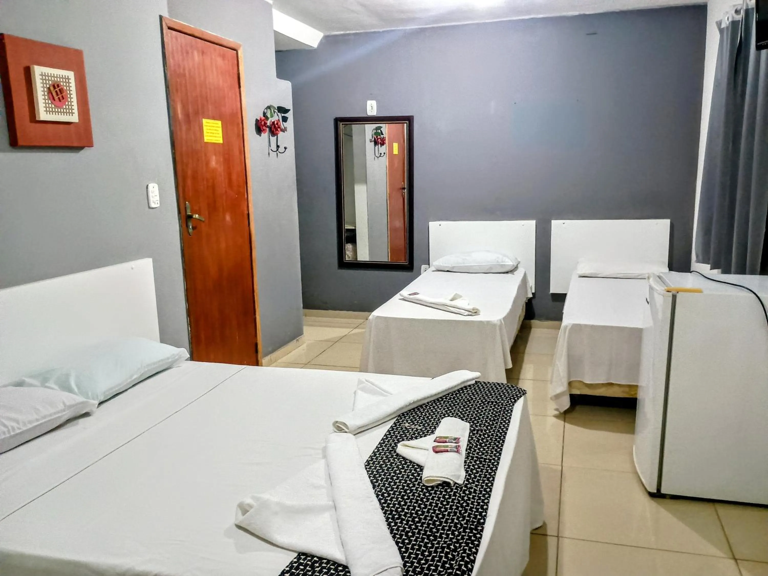 Photo of the whole room in OYO Pousada Recanto Shangrilá, Cabo Frio