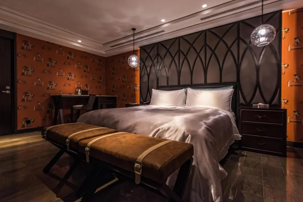 Bed in Green Palm Motel