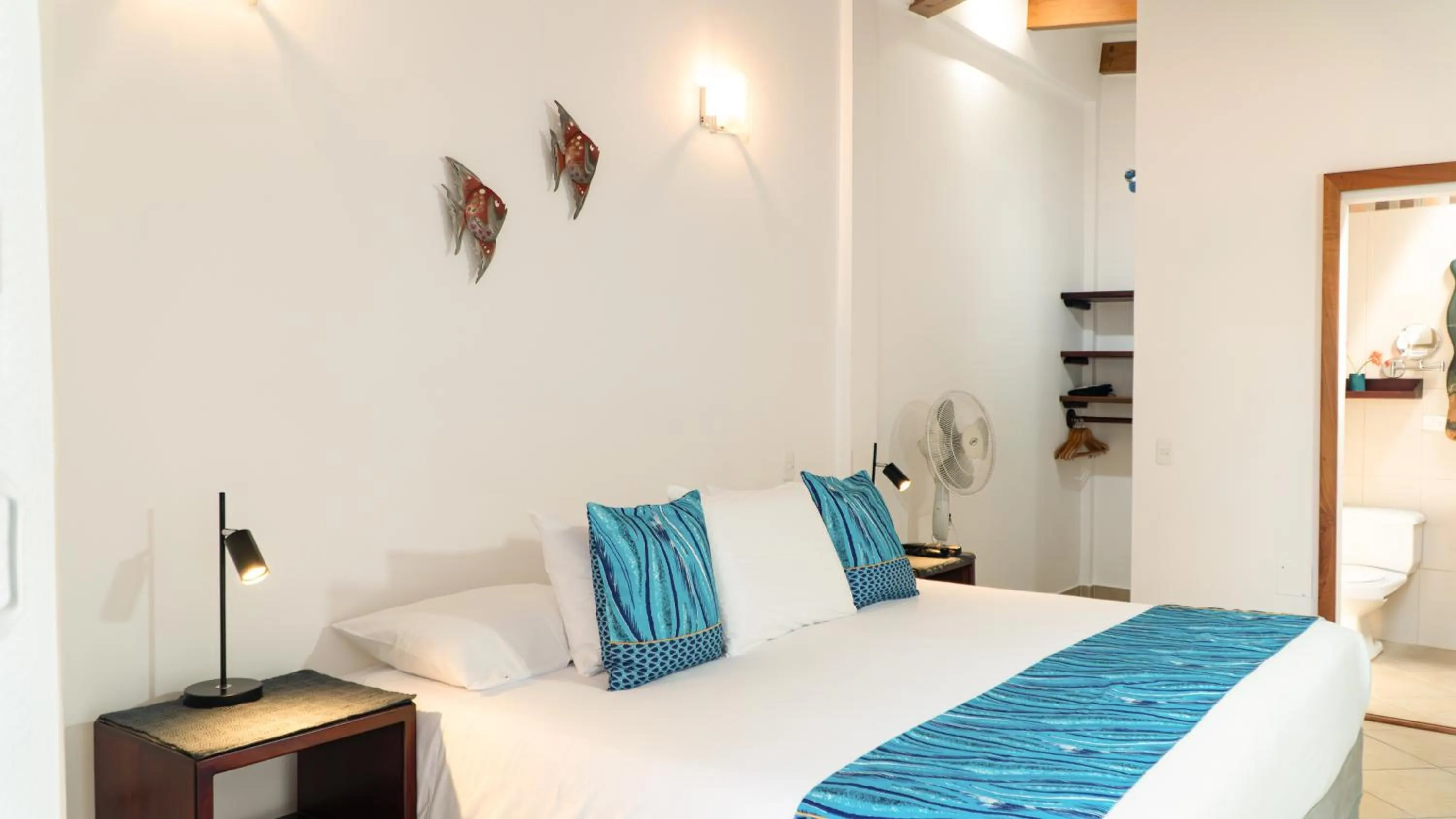 Bed in Hotel Galapagos Suites B&B