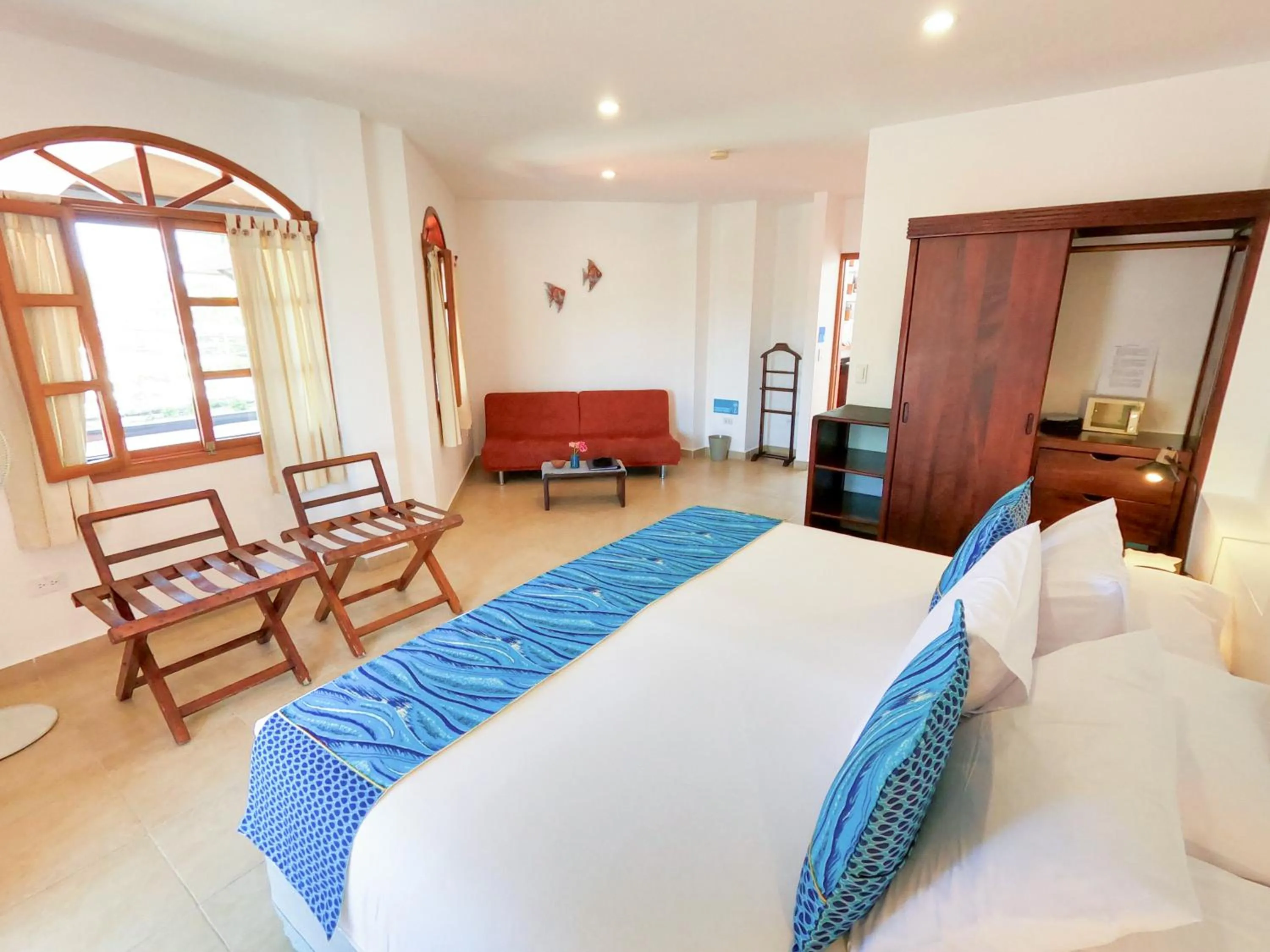 Bed in Hotel Galapagos Suites B&B