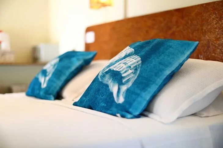 Bed in Pousada Ilha do Frade