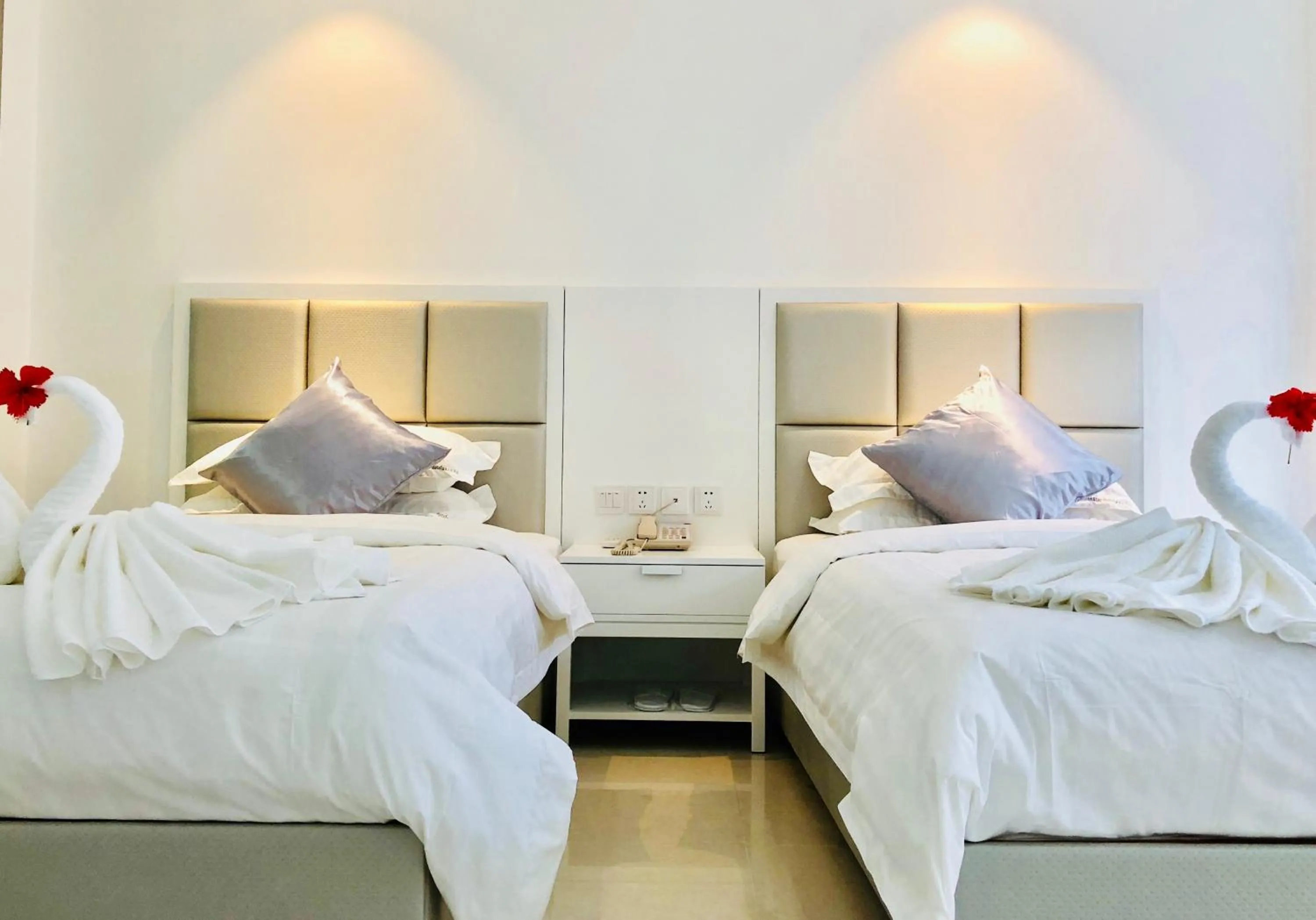 Bed in Ocean Star Hotel