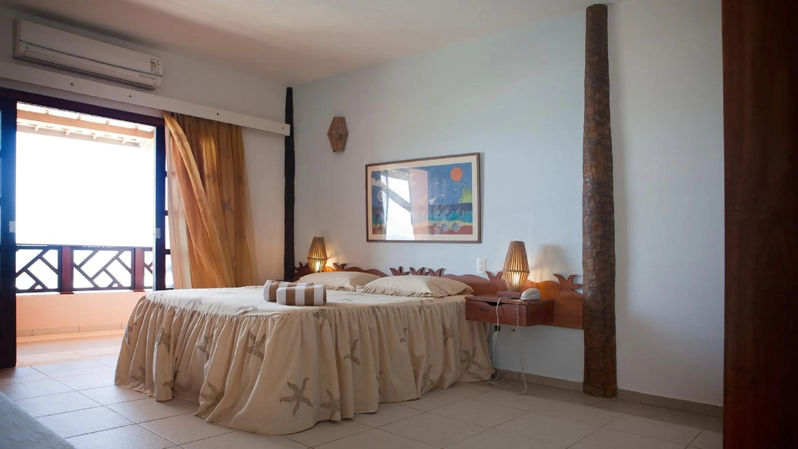 Bed in Bruno Marambaia Charme Hotel