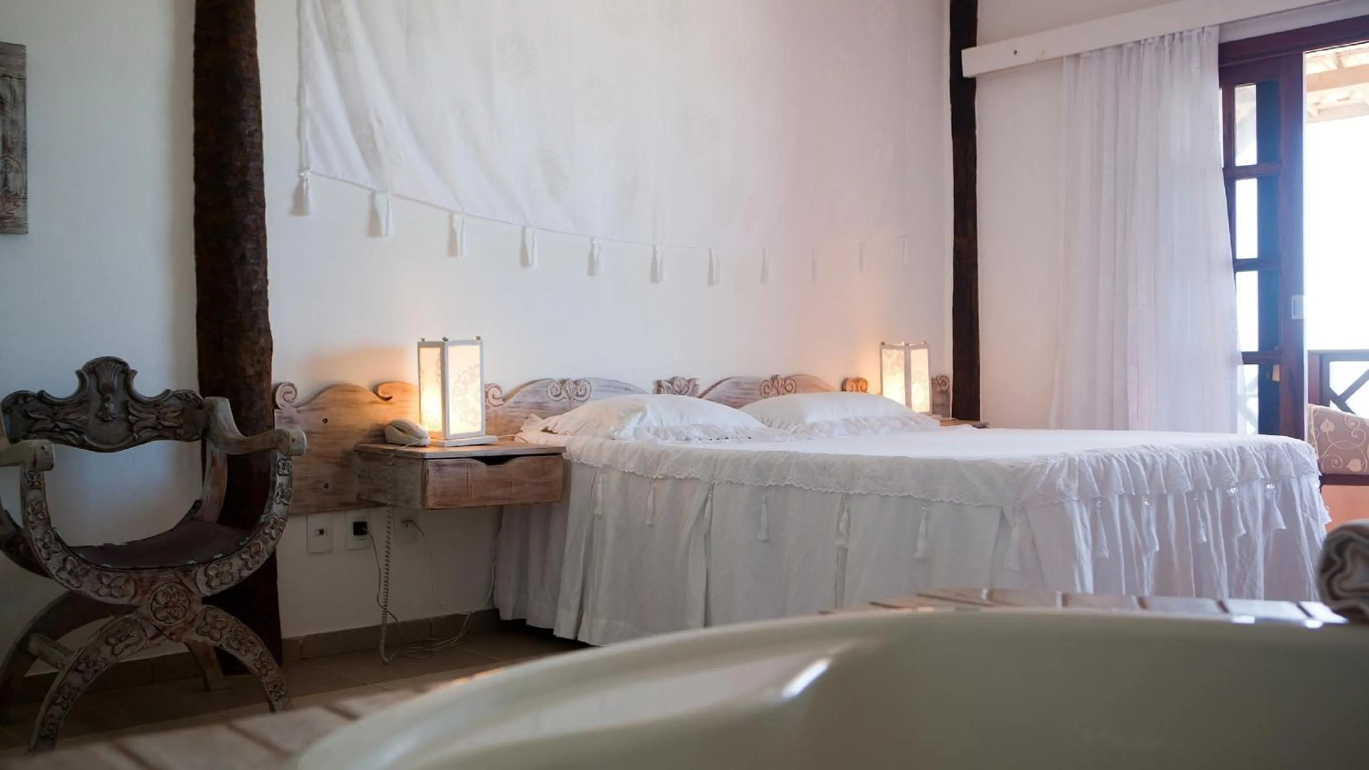 Bed in Bruno Marambaia Charme Hotel