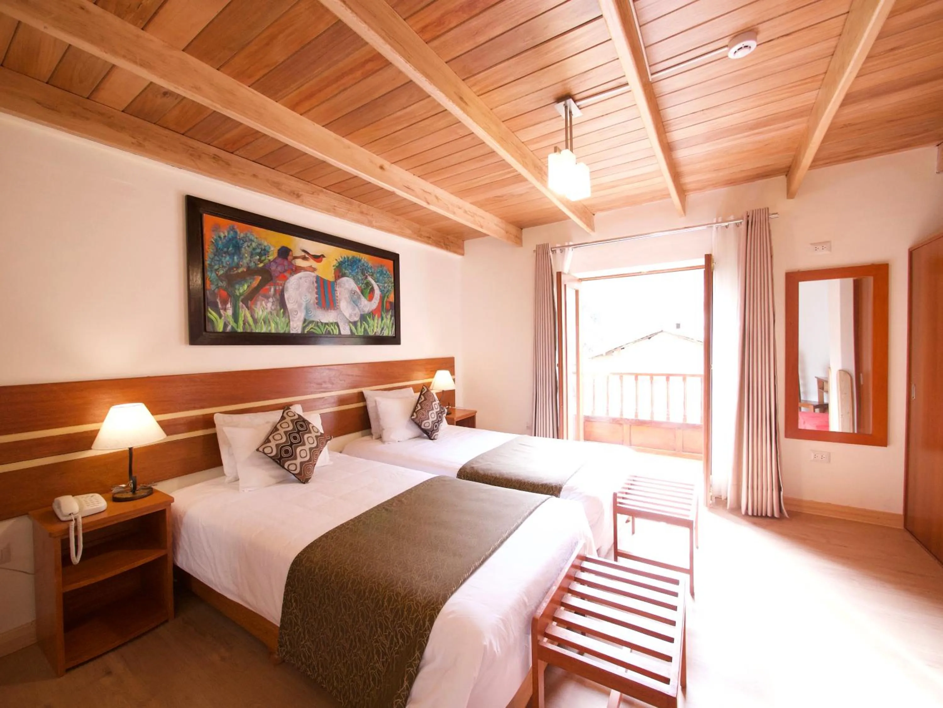 Bed in Sol Ollantay Boutique Hotel