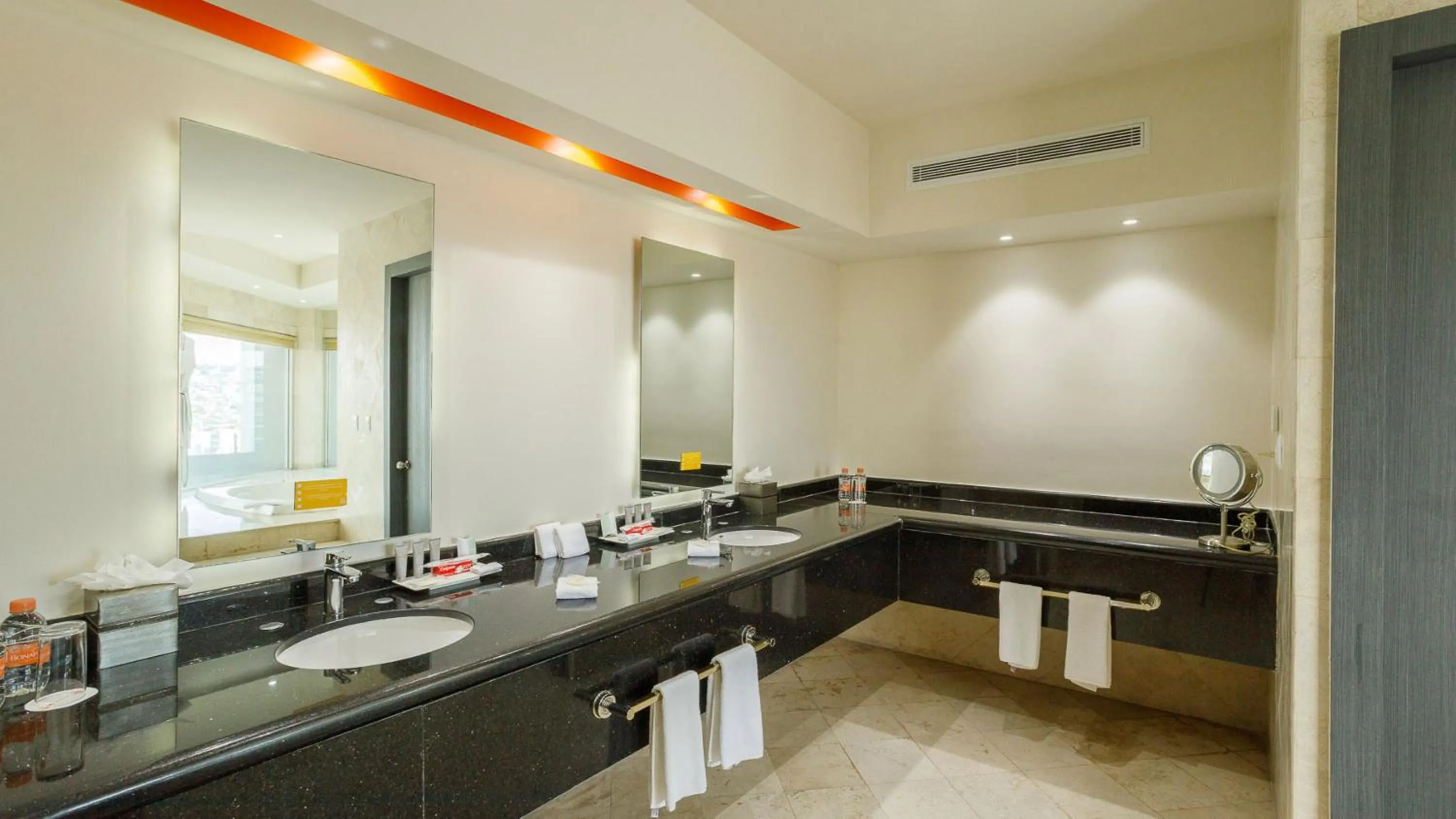 Bathroom in Real Inn Tijuana by Camino Real Hoteles