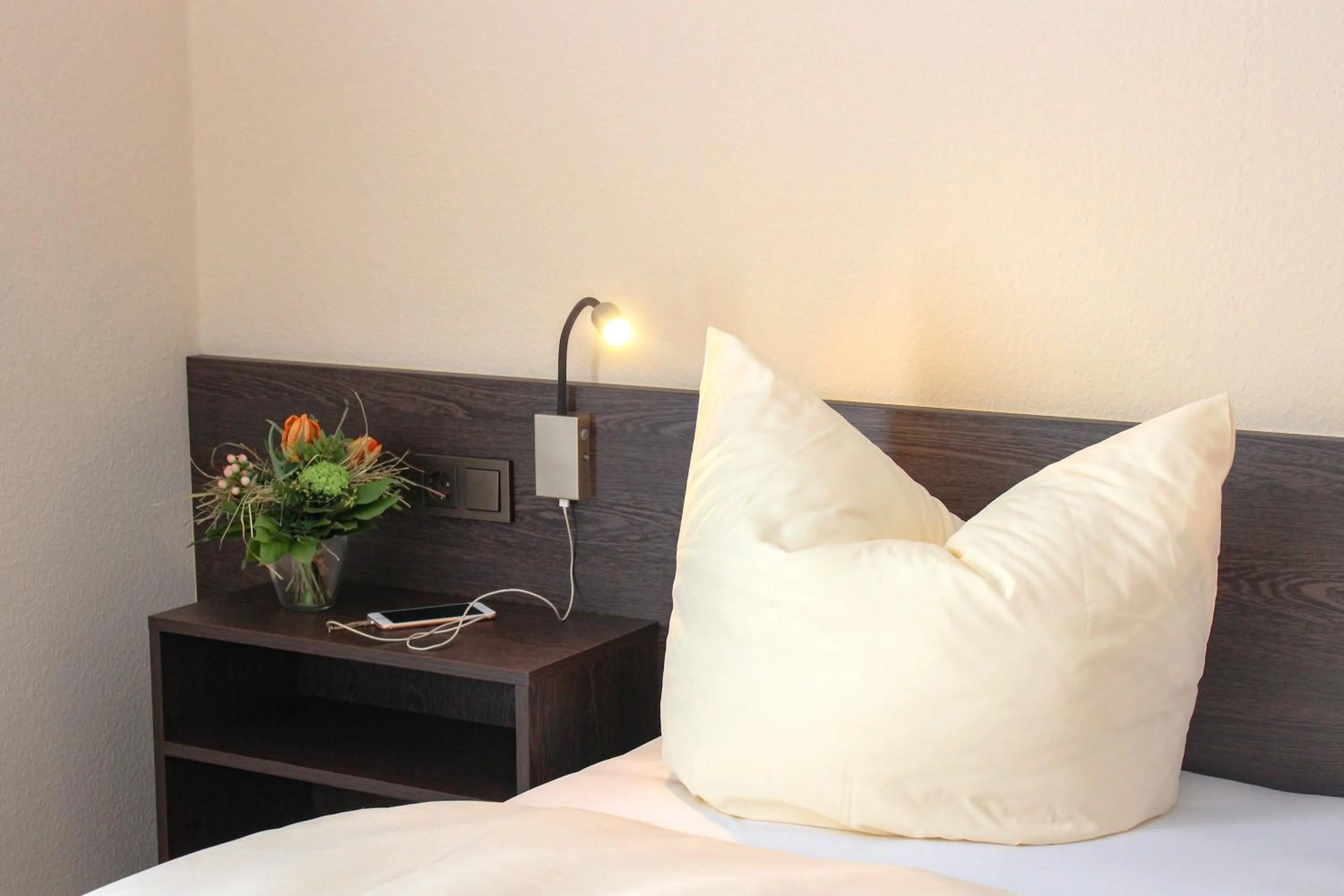 Bed in Hotel La Toscana Nähe Europapark und Rulantica