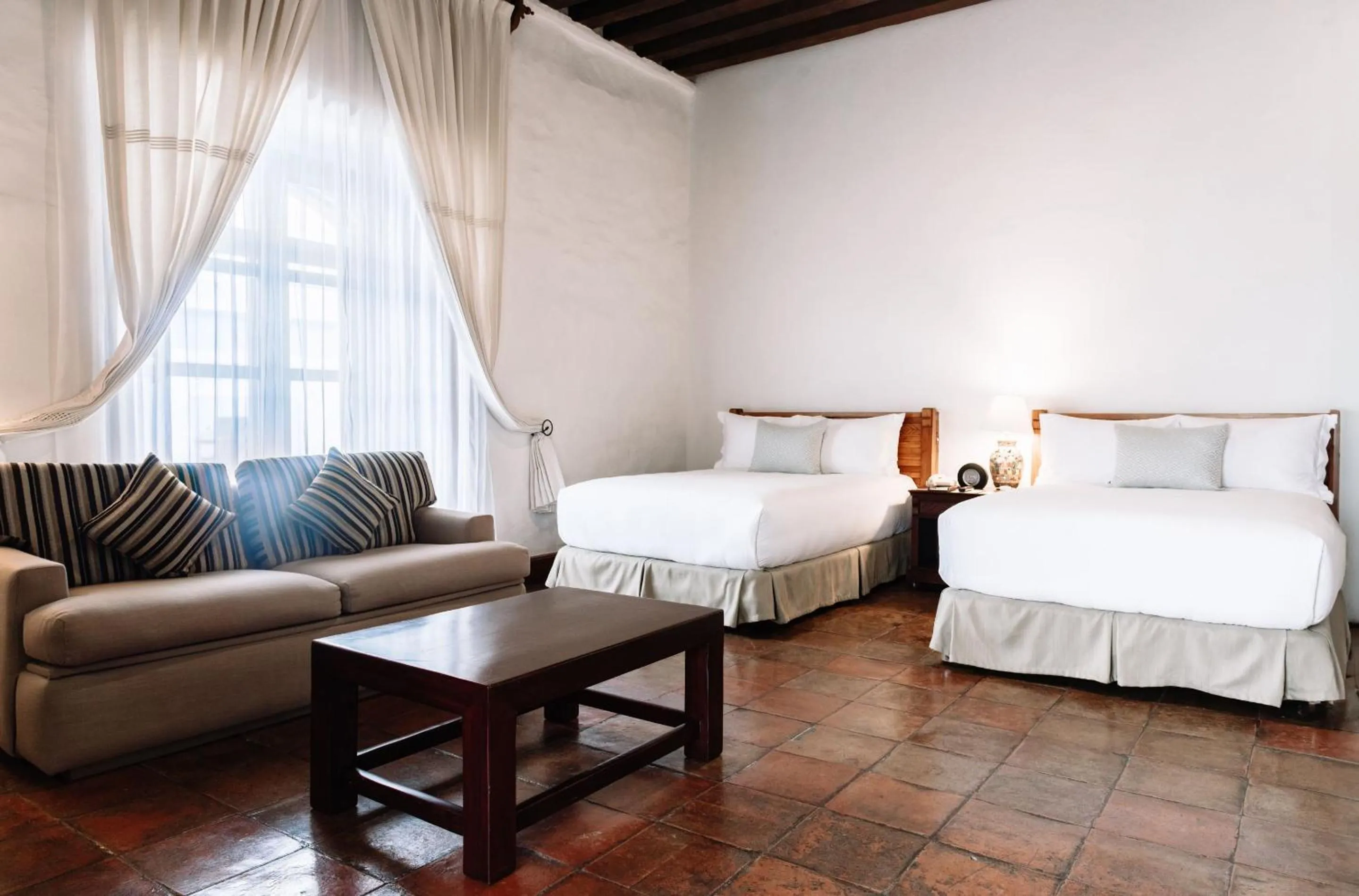 Bedroom, Bed in Quinta Real Oaxaca