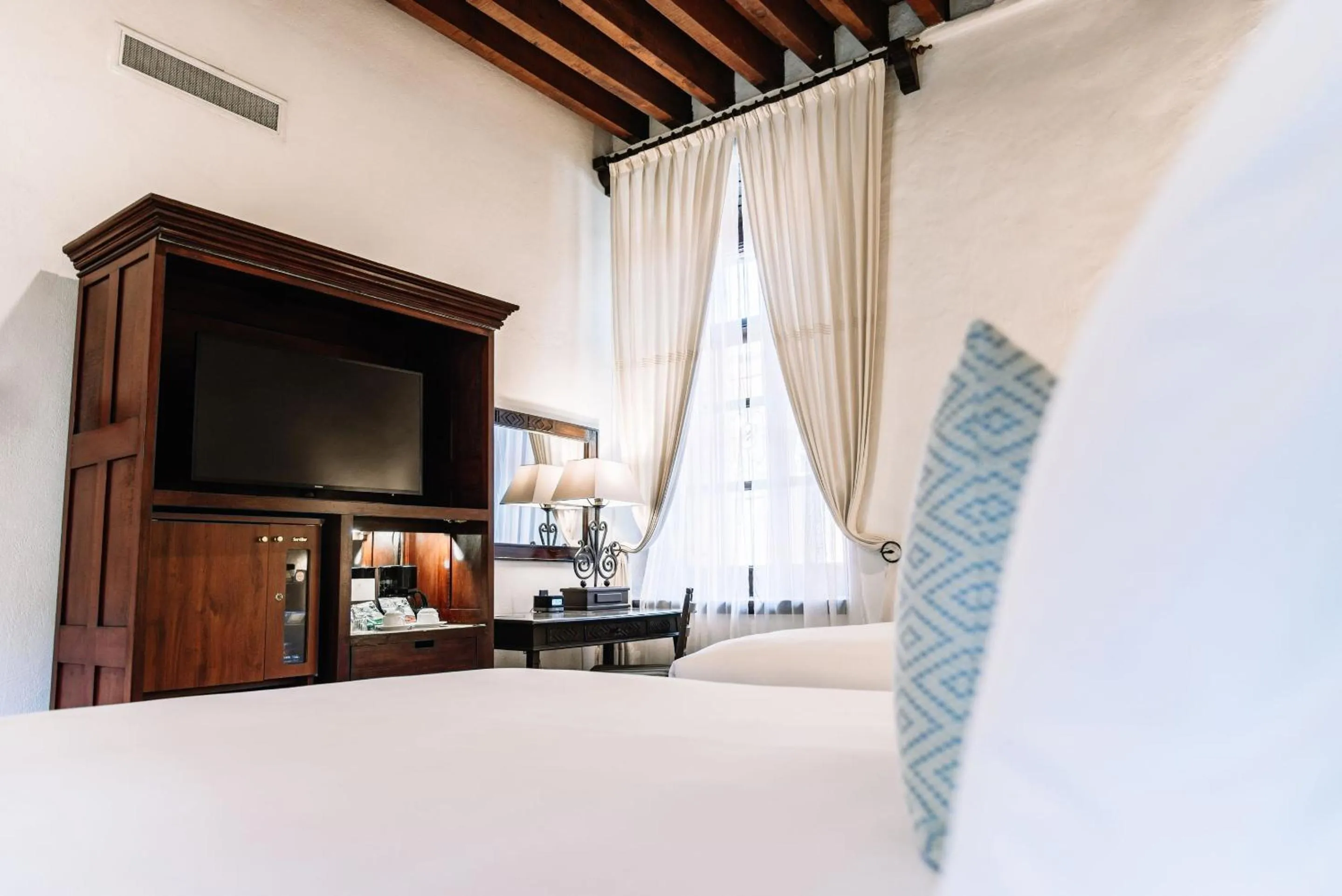 Bedroom, Bed in Quinta Real Oaxaca