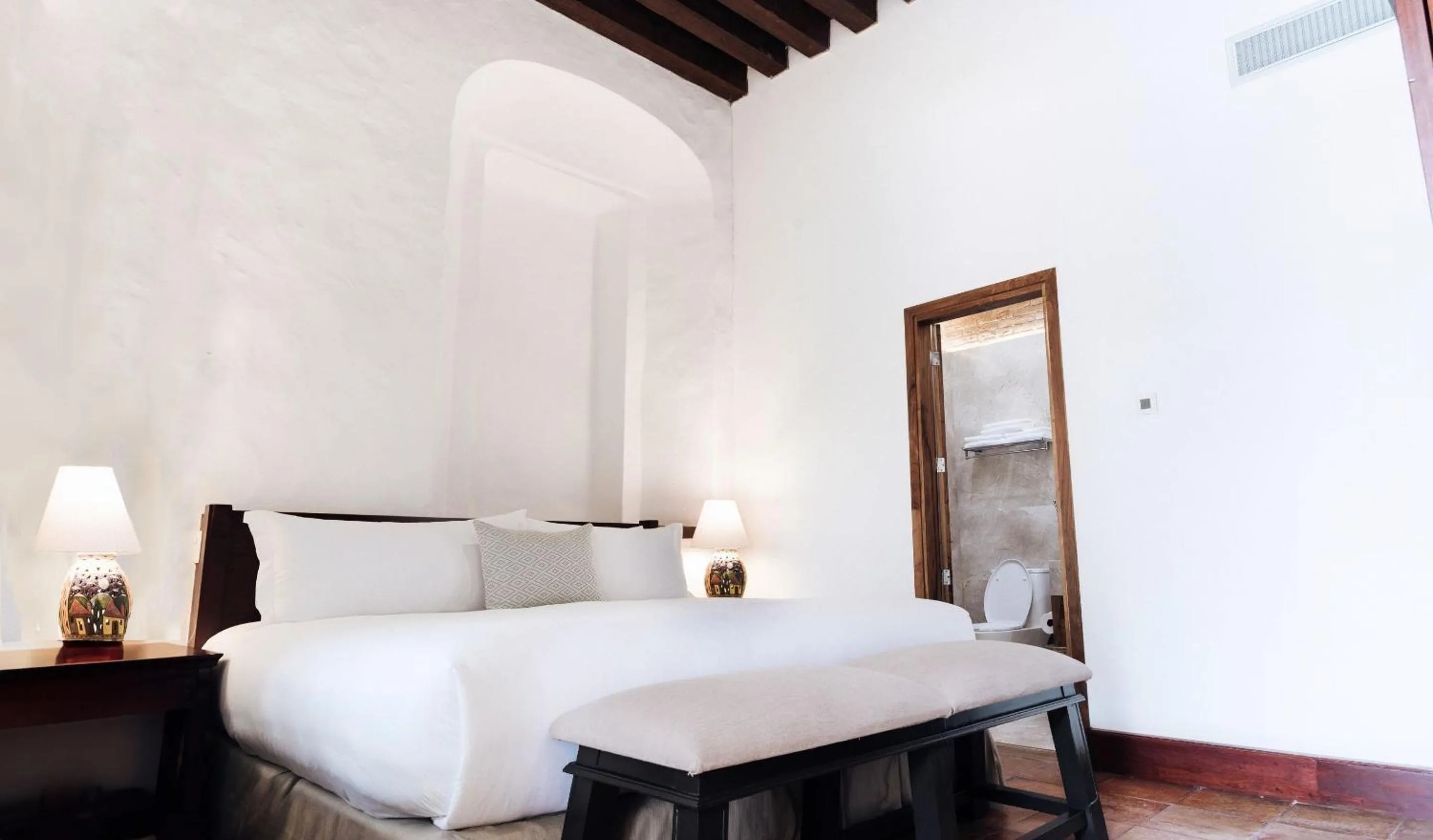 Bedroom, Bed in Quinta Real Oaxaca