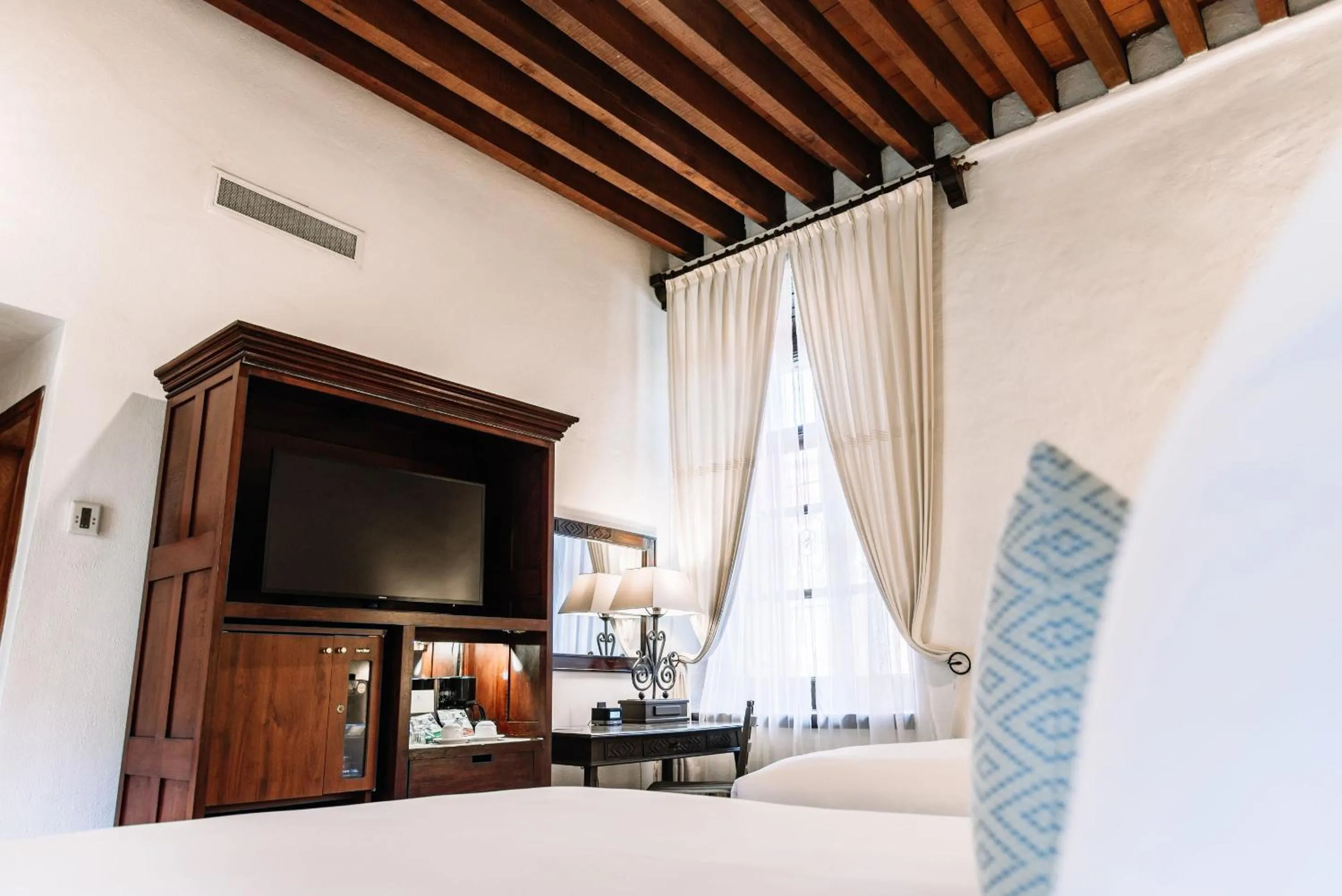 Bedroom, Bed in Quinta Real Oaxaca