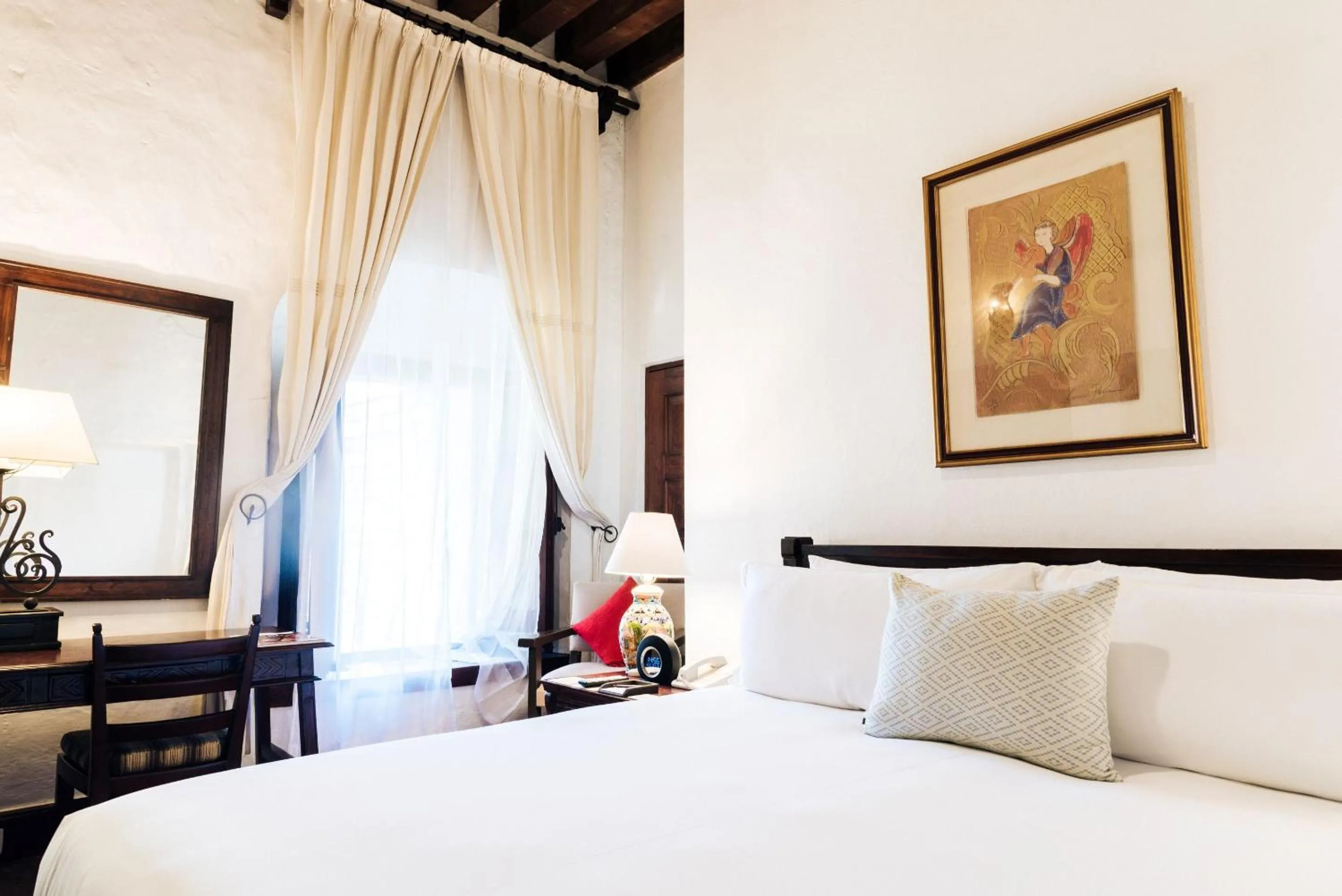 Photo of the whole room, Bed in Quinta Real Oaxaca