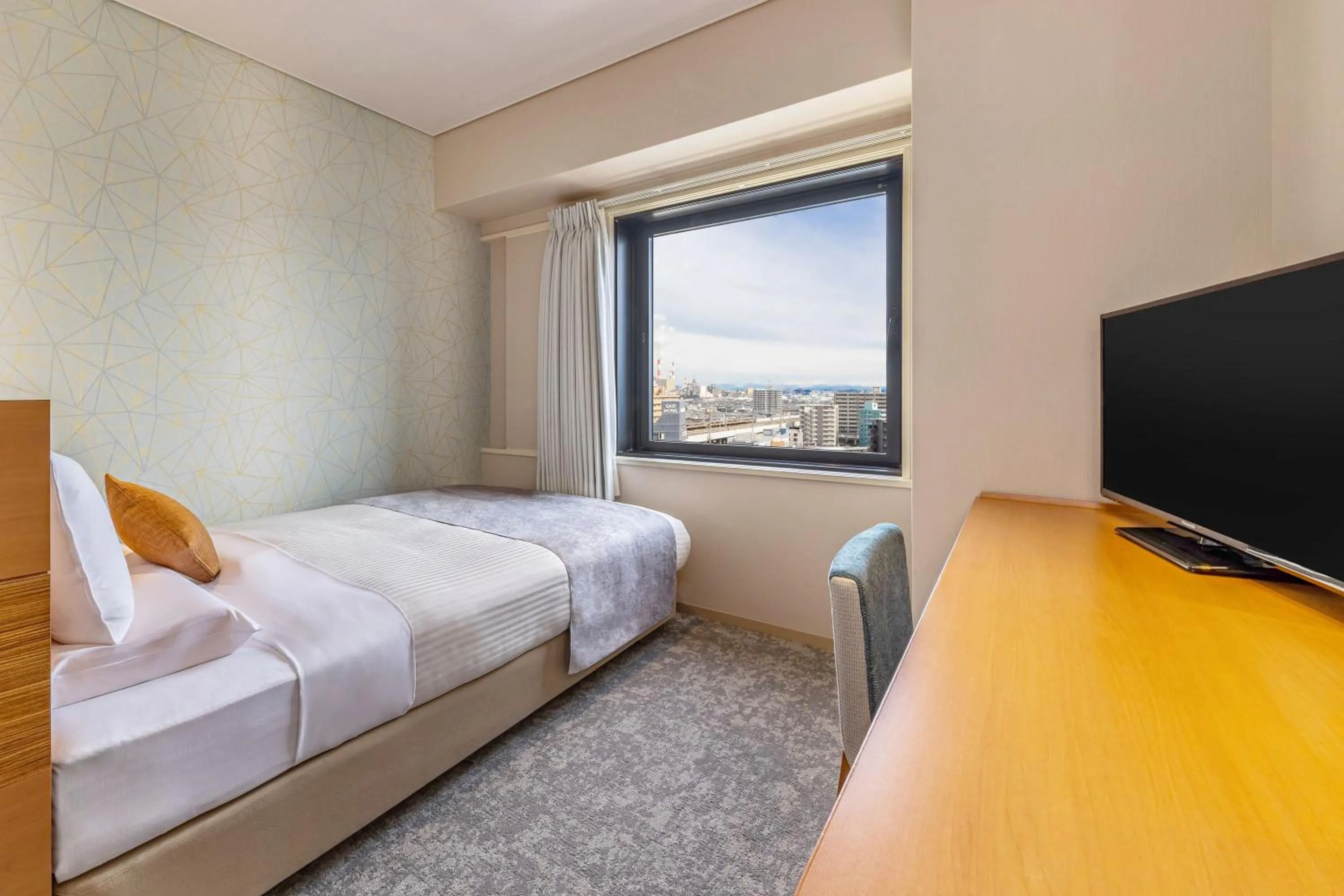 Photo of the whole room, Bed in Art Hotel Niigata Station