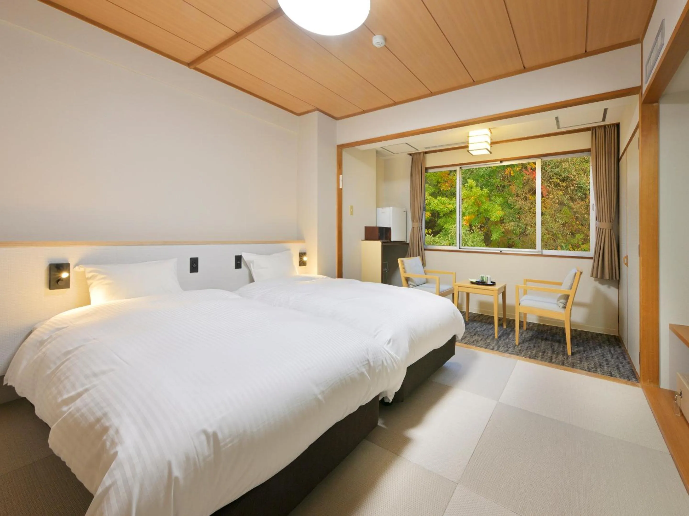 Photo of the whole room, Bed in Noboribetsu Manseikaku