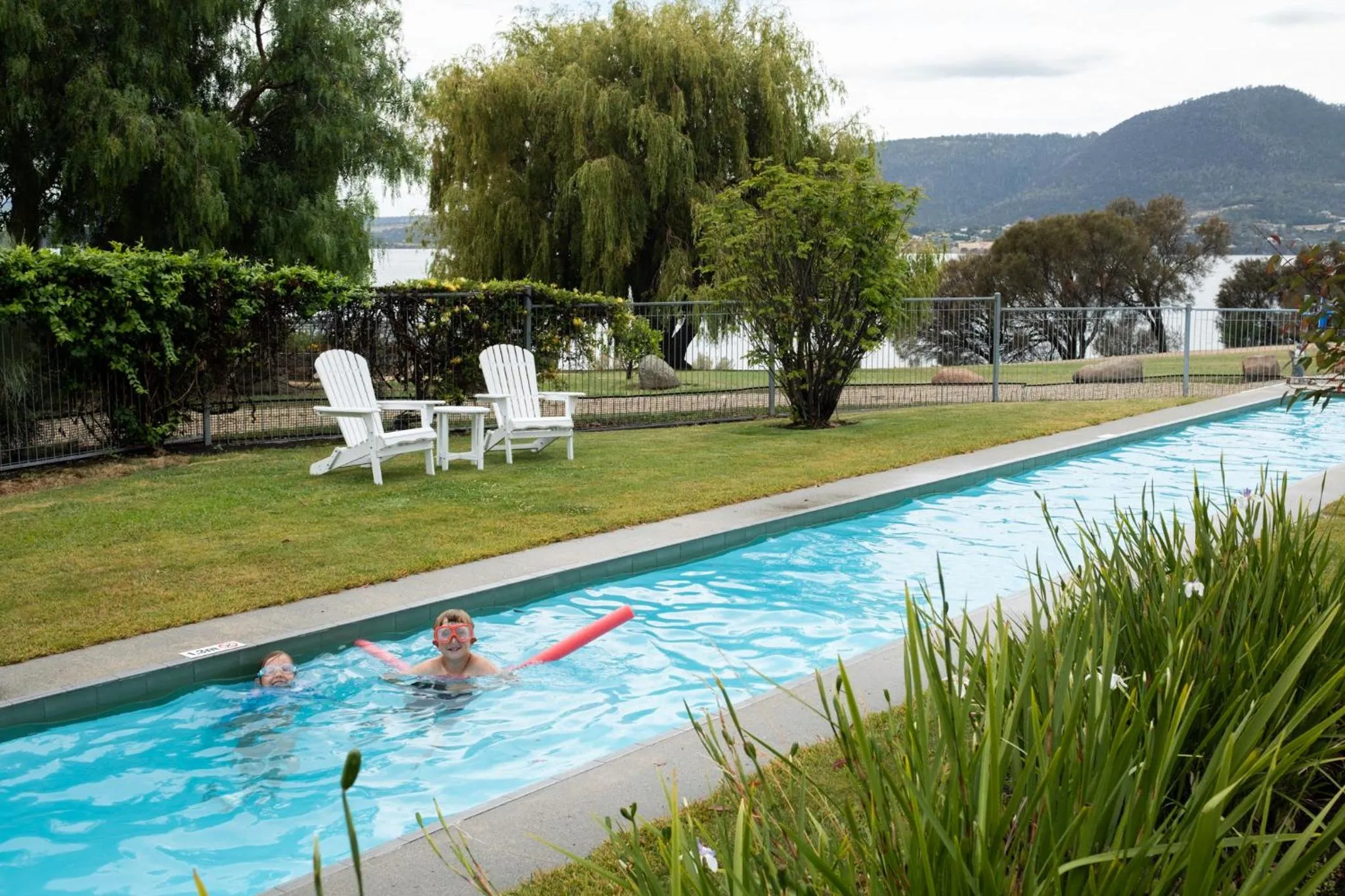 Swimming pool in Riverfront Motel & Restaurant