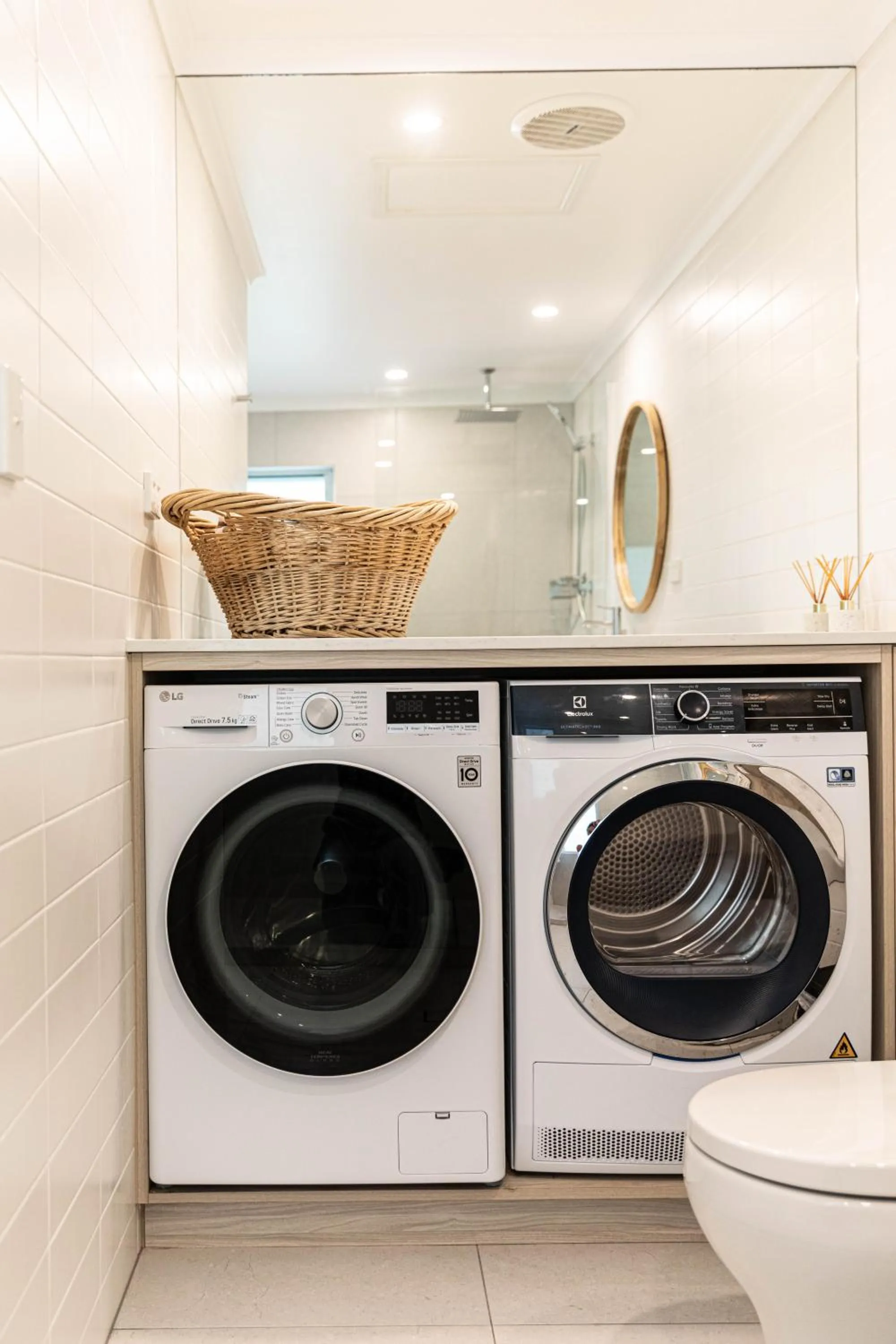 washing machine in Beaches Holiday Apartments - Official Onsite Reception & Check In