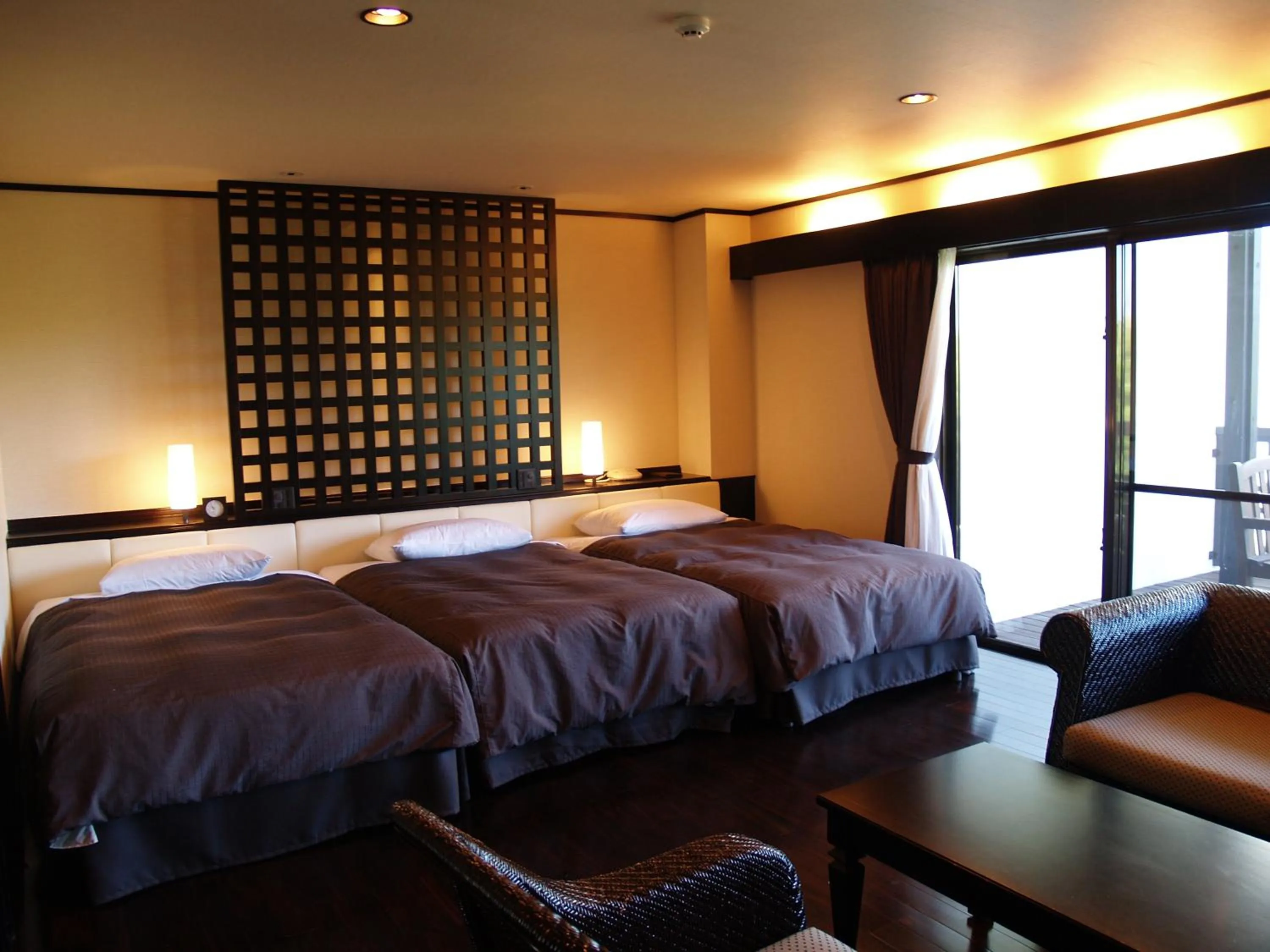 Bed in Okuma Private Beach & Resort
