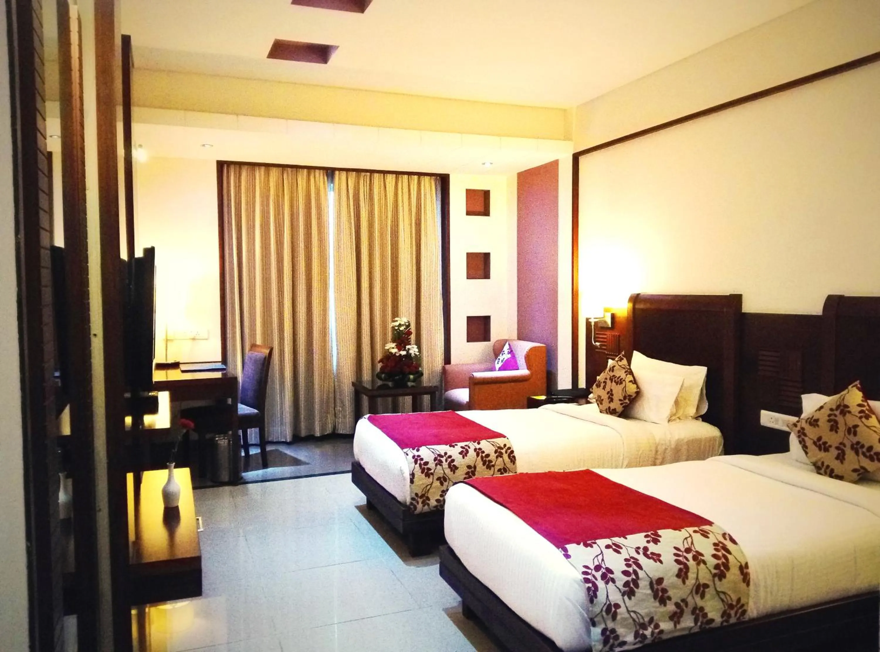 TV and multimedia, Bed in Royal Orchid Central, Shimoga