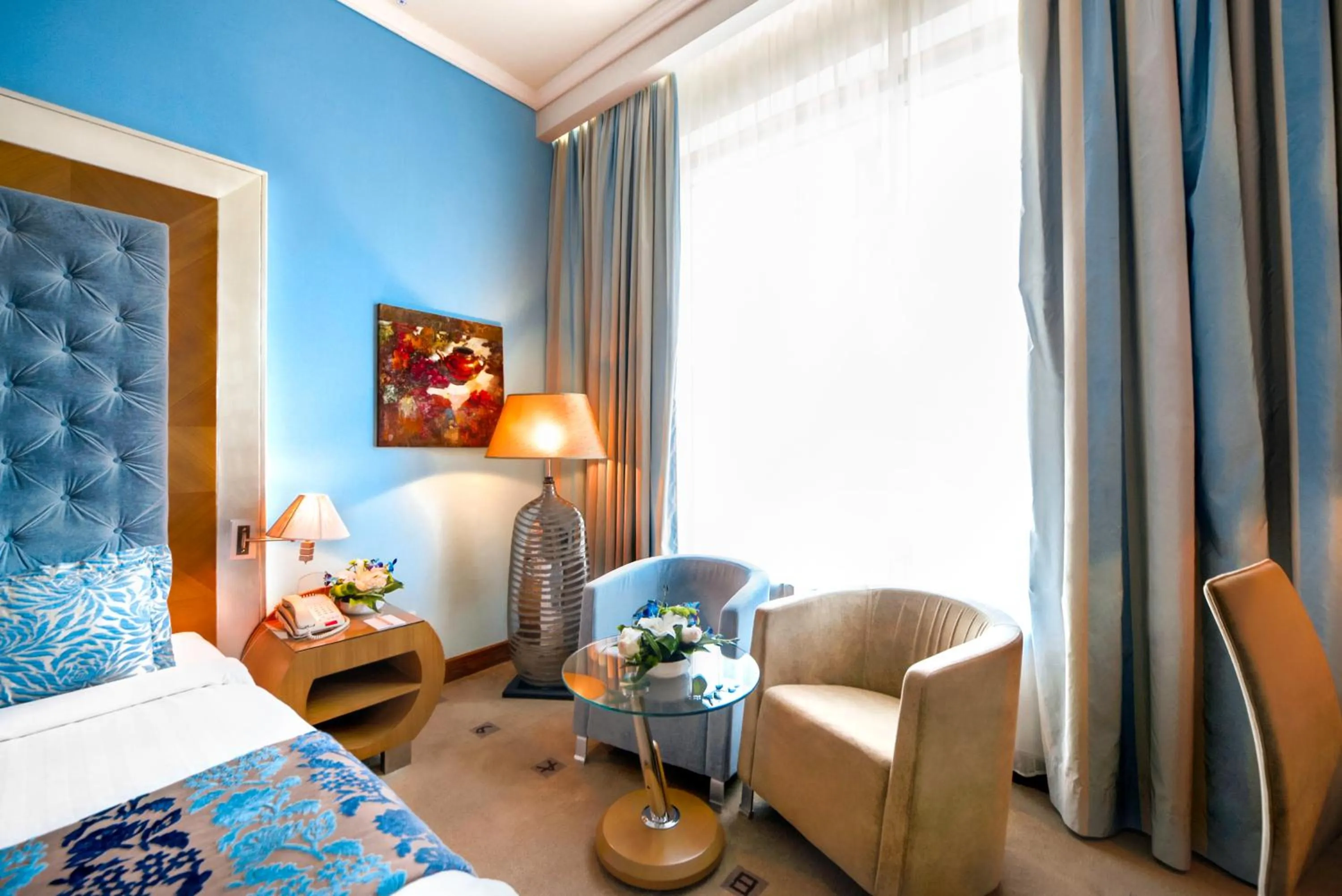 Living room, Bed in Marina Byblos Hotel