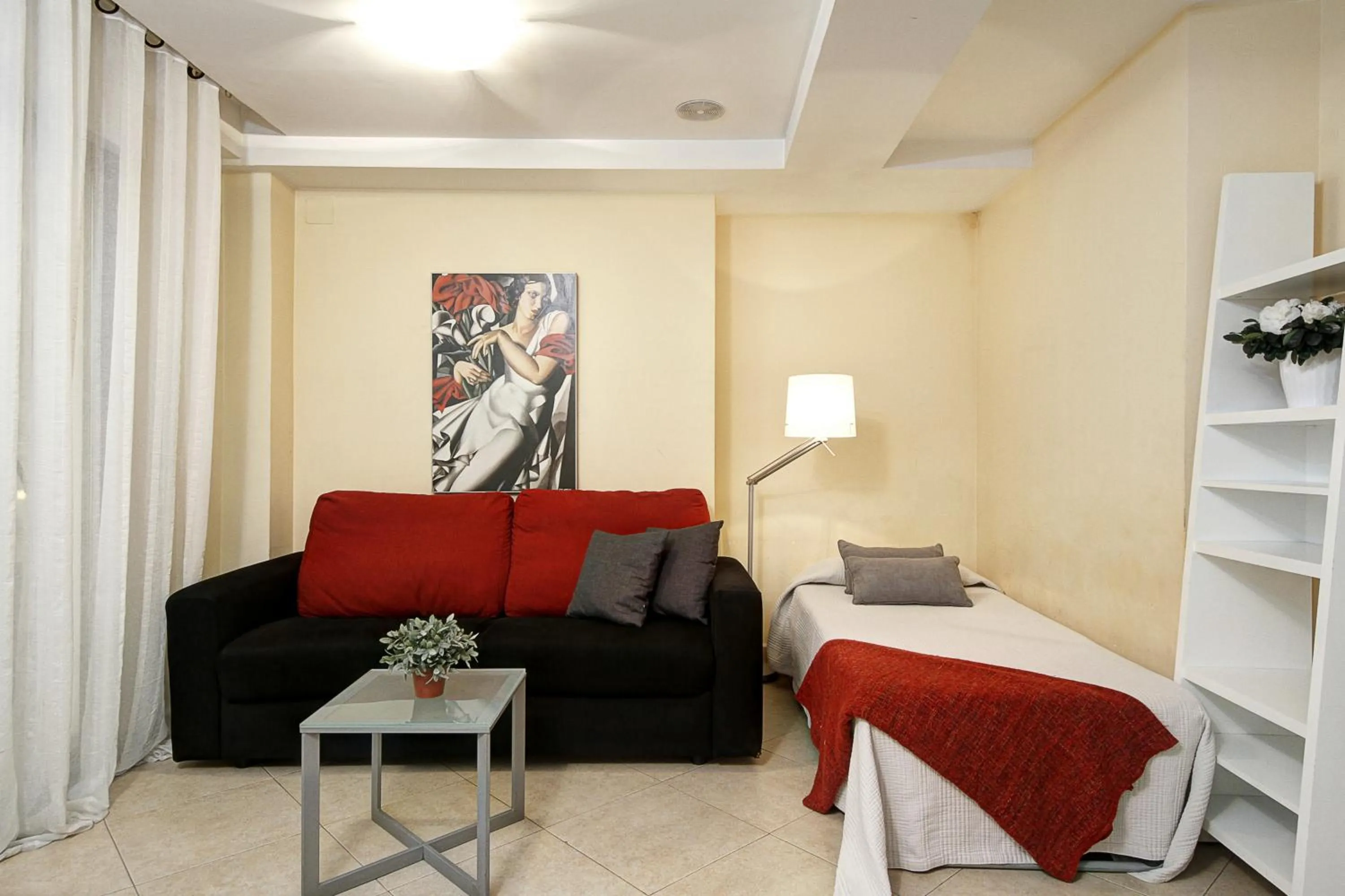 Living room, Bed in Apartamentos Turísticos Centro