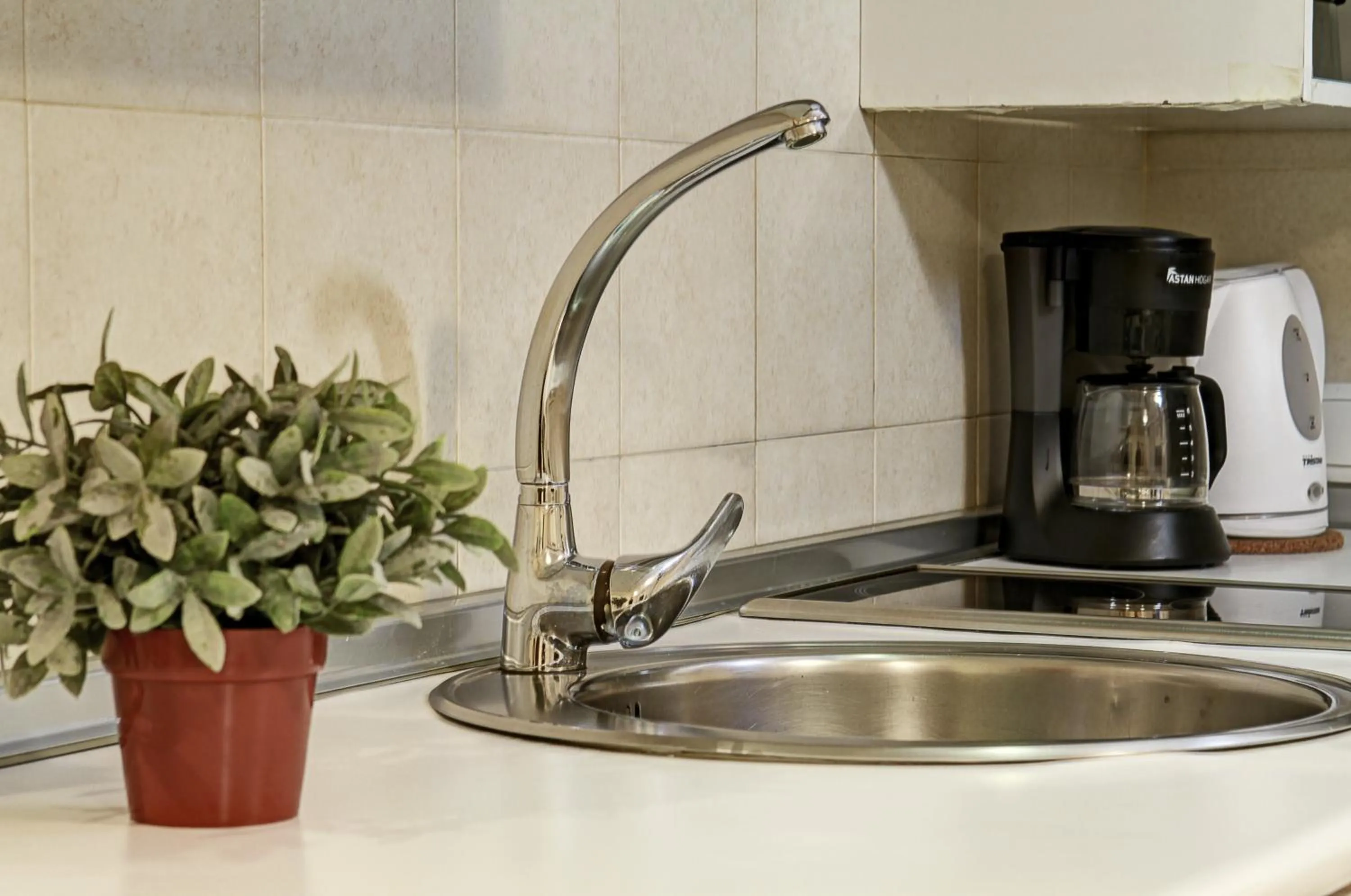 Kitchen or kitchenette in Apartamentos Turísticos Centro