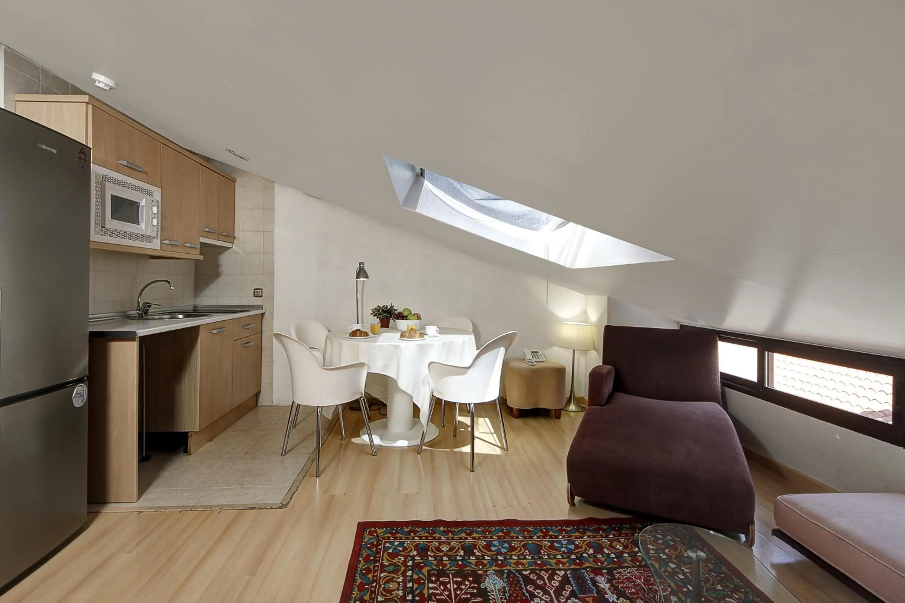 Kitchen or kitchenette in Apartamentos Turísticos Centro