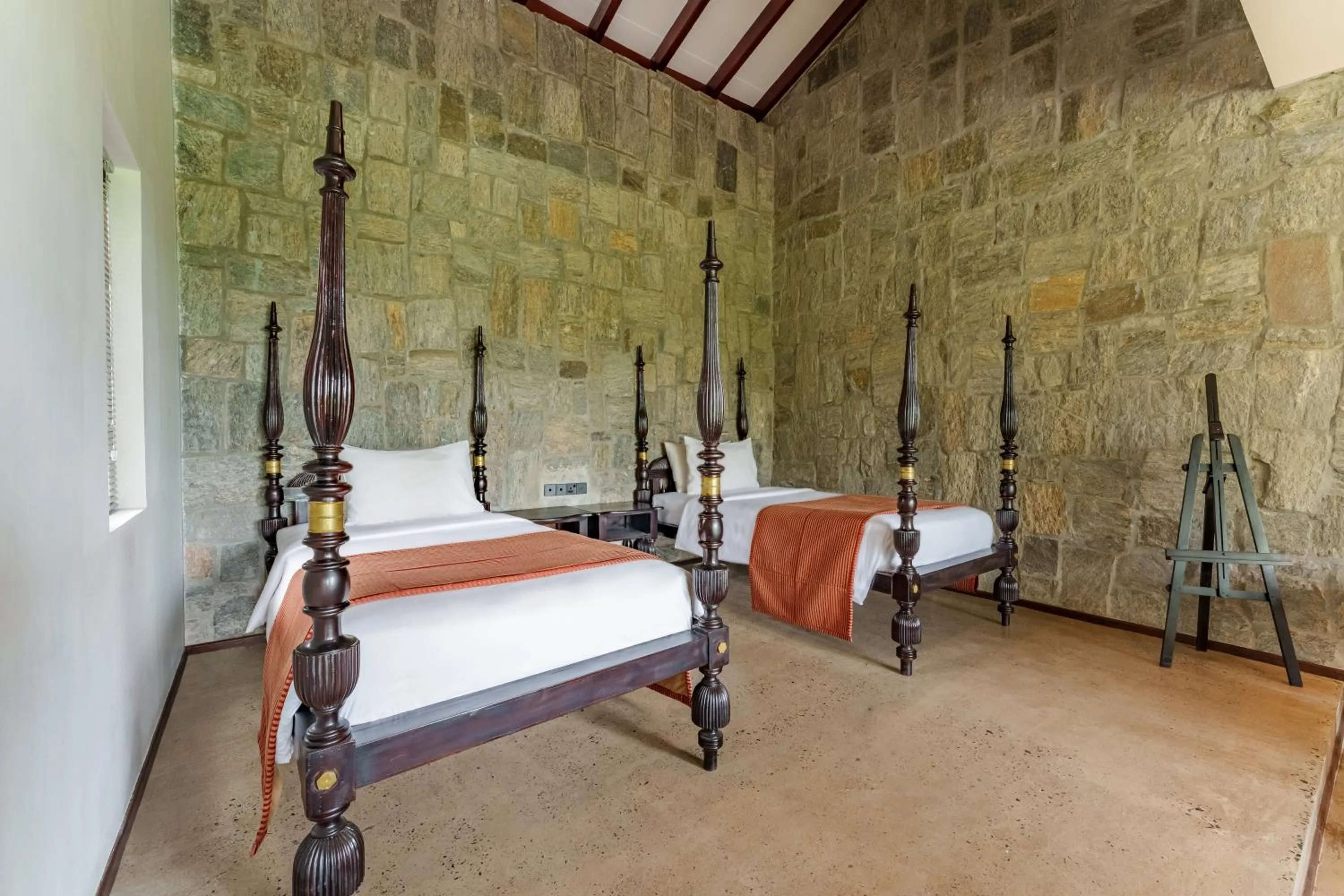 Bed in Ayugiri Ayurveda Wellness Resort Sigiriya