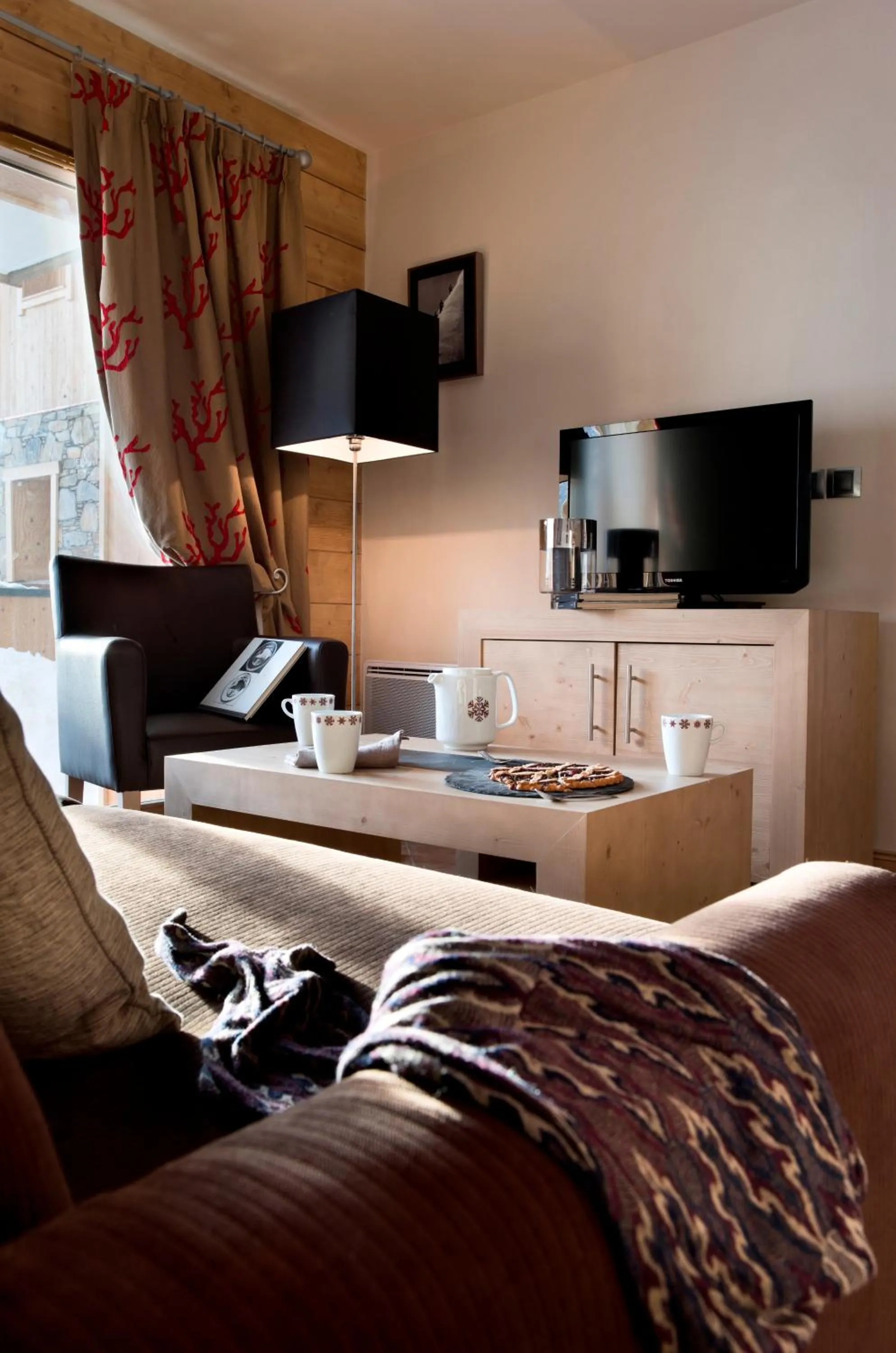 Living room in CGH Résidences & Spas l'Orée des Neiges