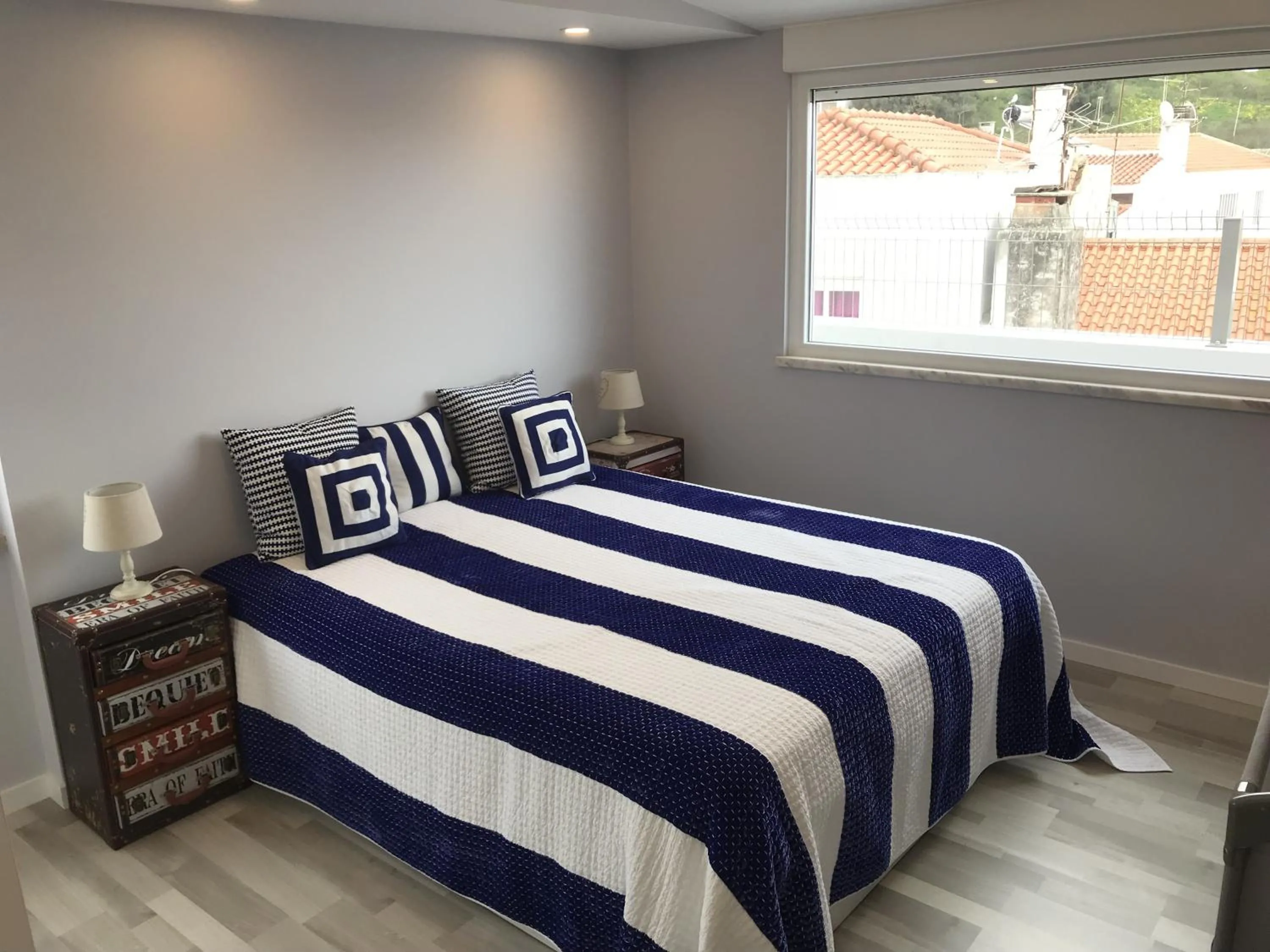 Bed in Blue Bay Beach Apartment