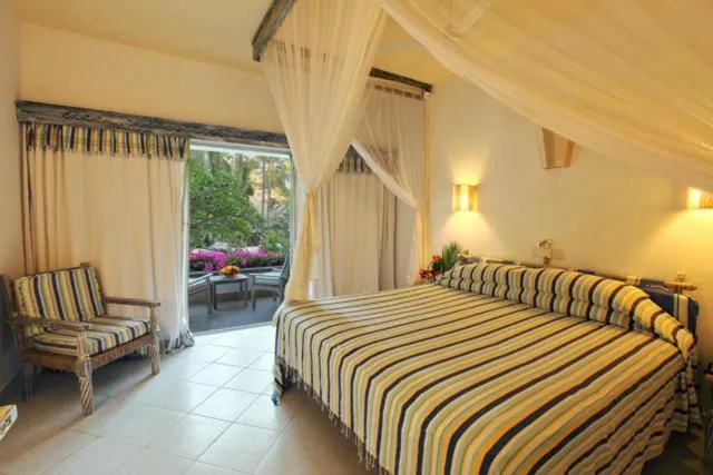 Bed in Turtle Bay Beach Club- All Inclusive