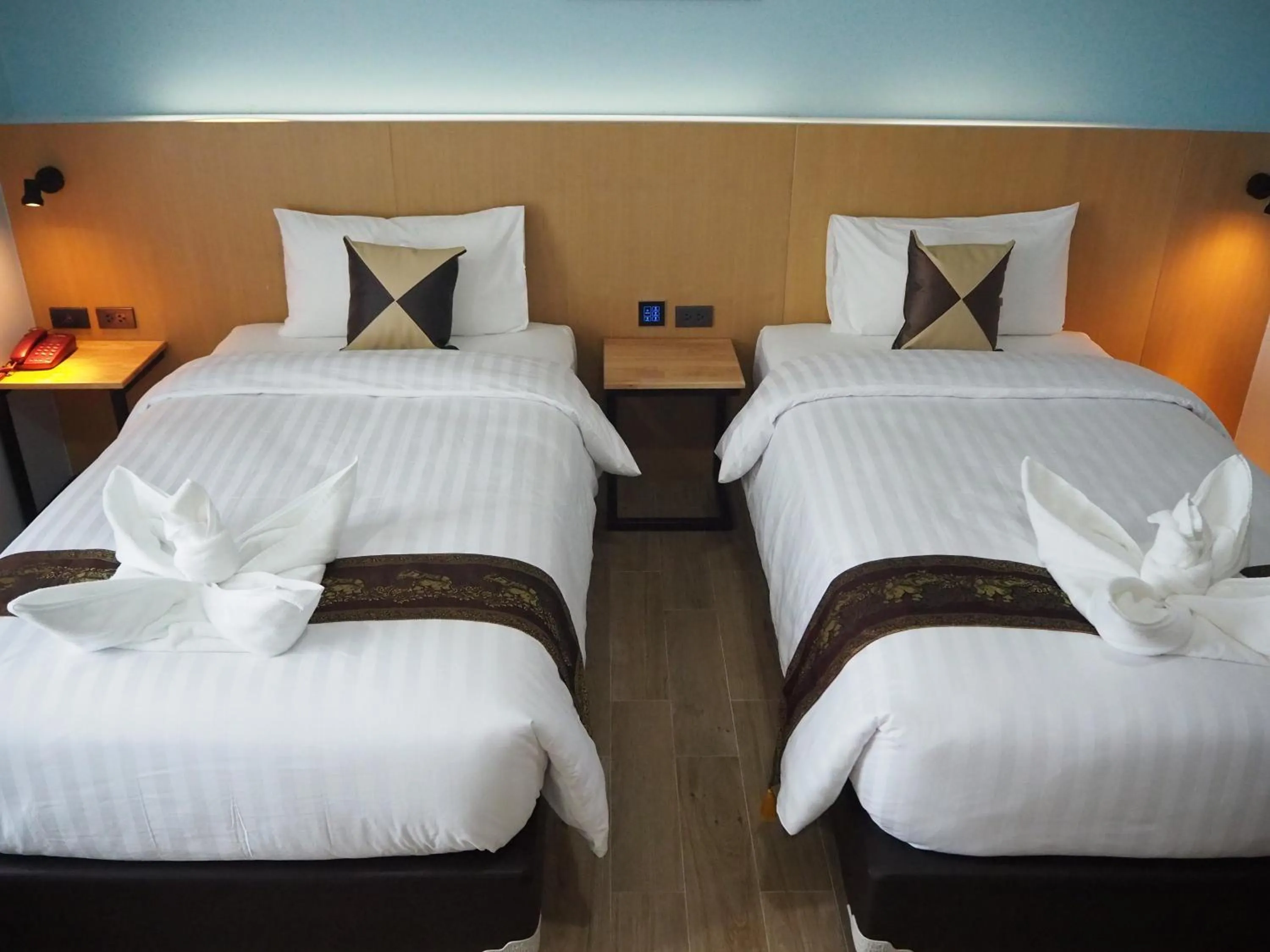 Bed in Samui City Hotel