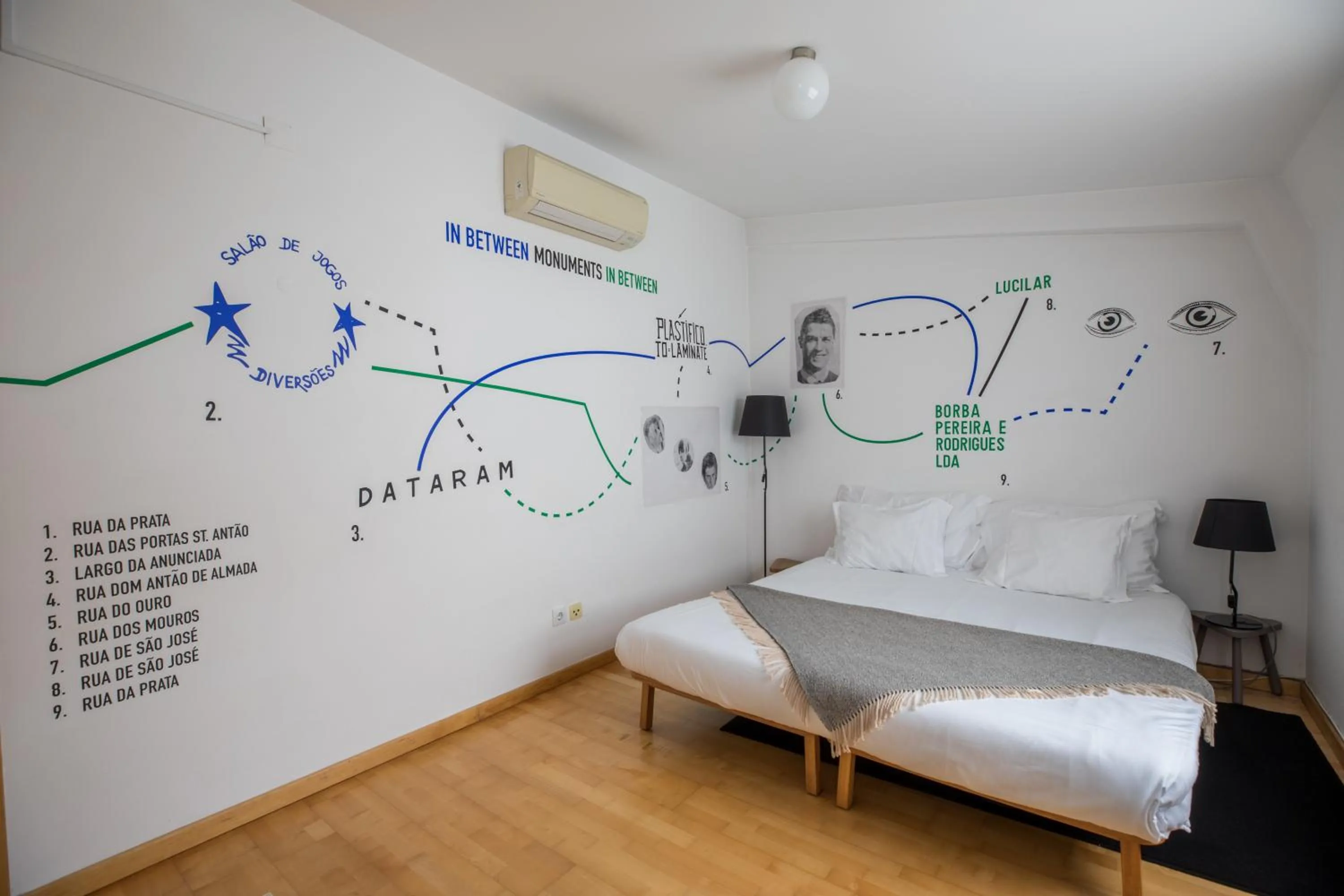 Bed in The Lisbonaire Apartments