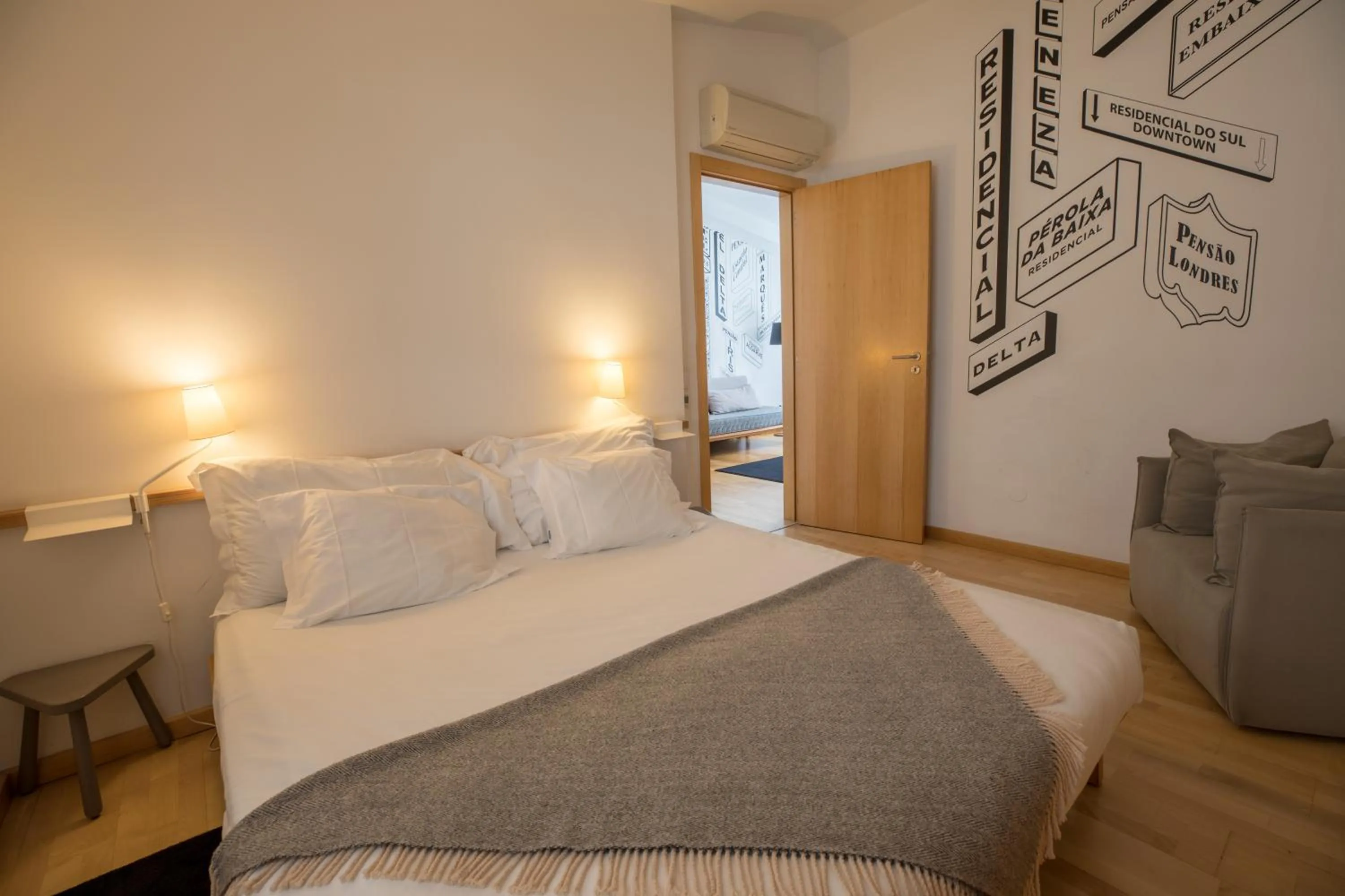 Bed in The Lisbonaire Apartments