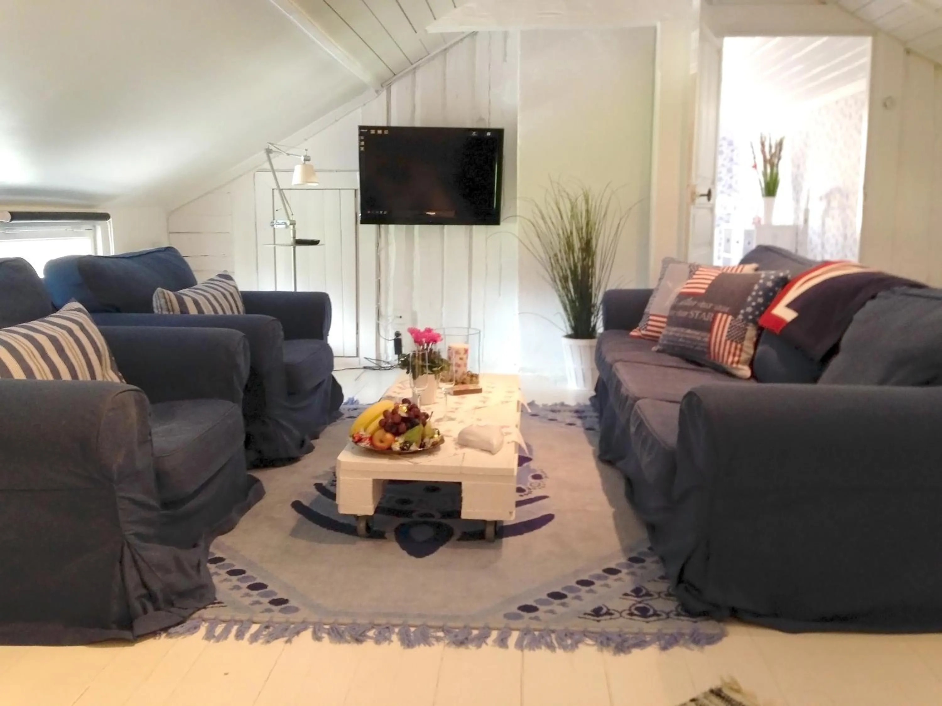 Living room in Johanssons Gårdshotell i Roslagen