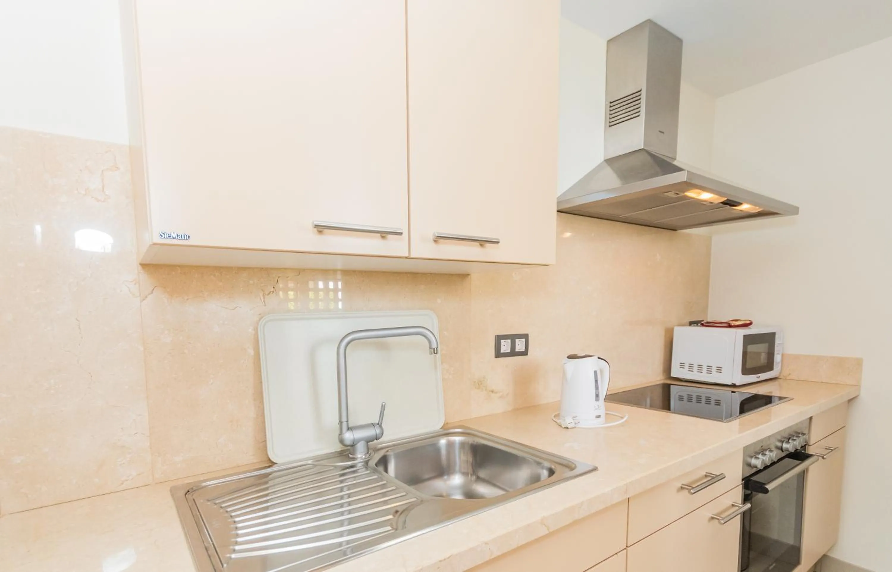 Kitchen or kitchenette in Cortijo Del Mar Resort