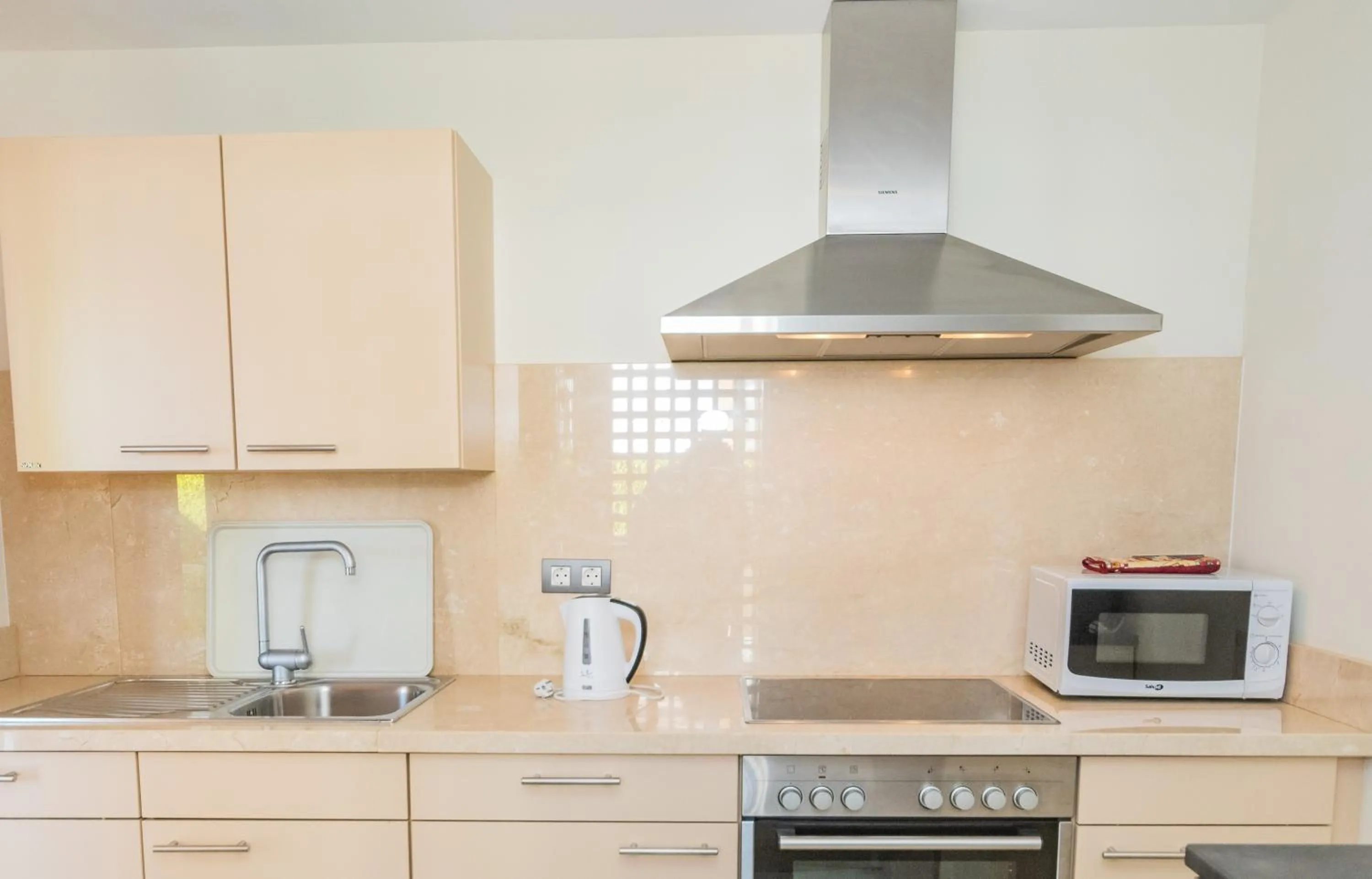 Kitchen or kitchenette in Cortijo Del Mar Resort